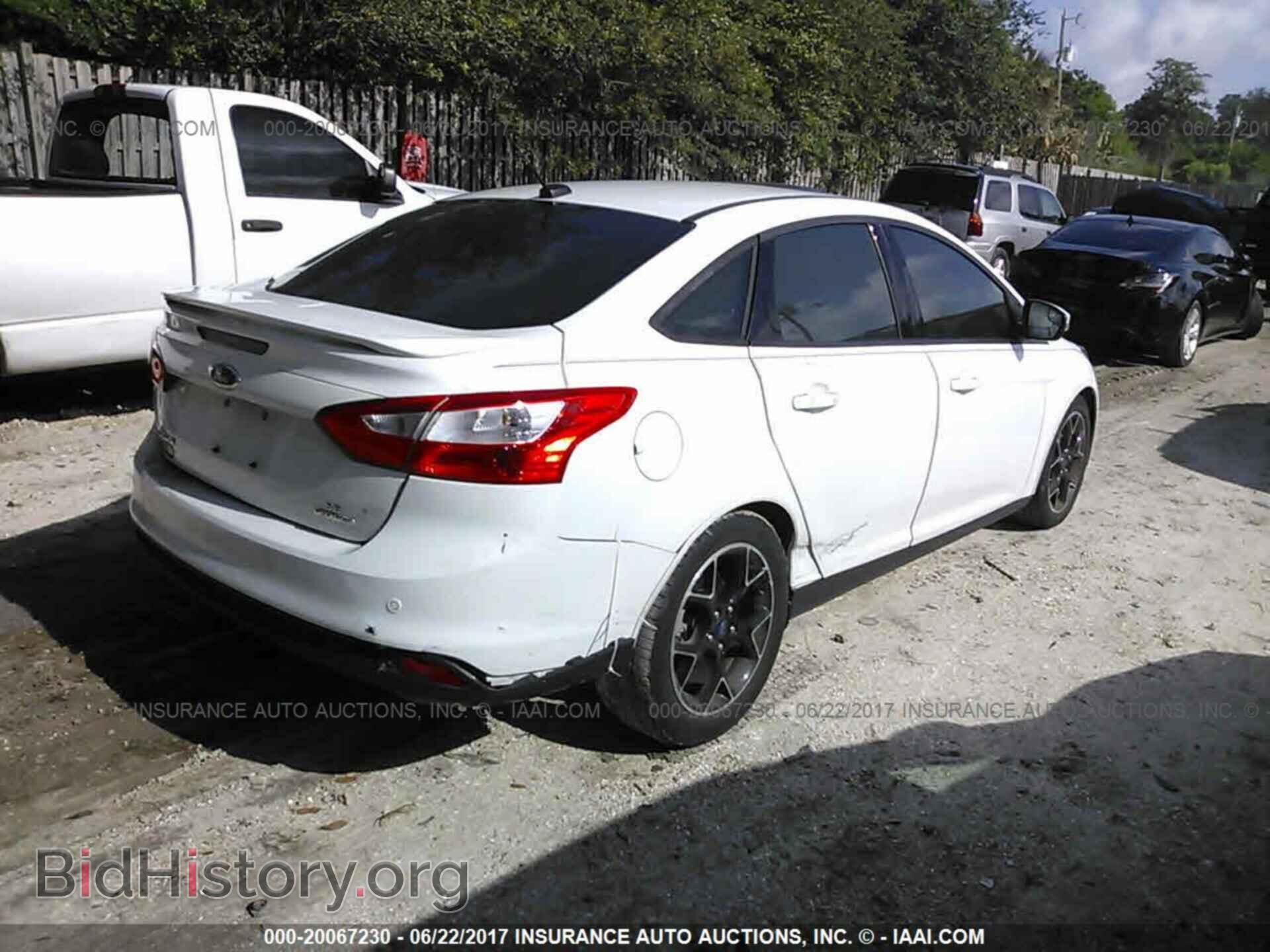 2014 Ford Focus - VIN: 1FADP3F24EL309683 - Фото 4
