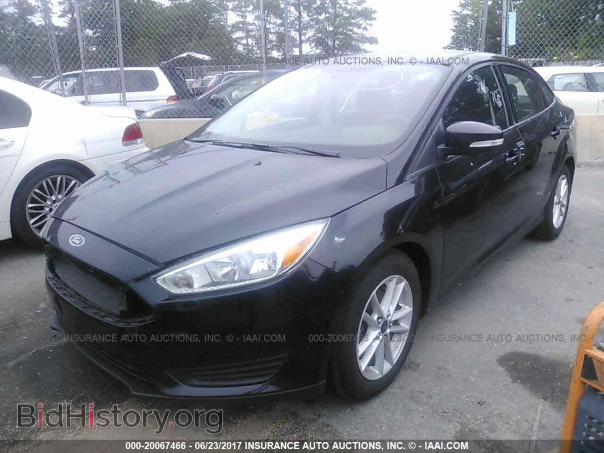 2015 Ford Focus - VIN: 1FADP3F21FL323221 - Фото 2