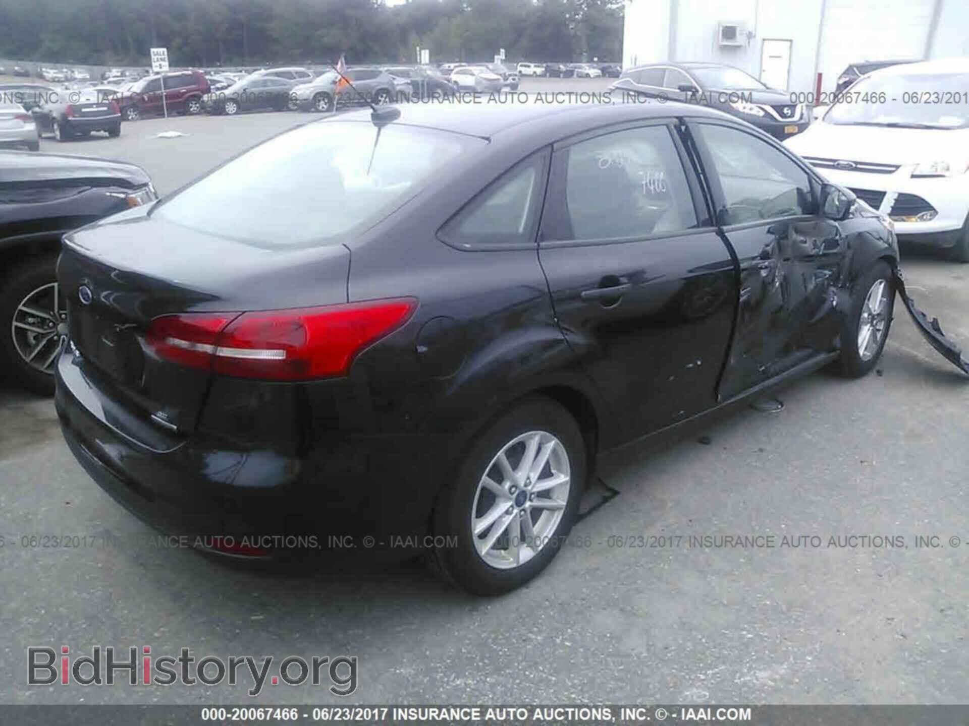 2015 Ford Focus - VIN: 1FADP3F21FL323221 - Фото 4