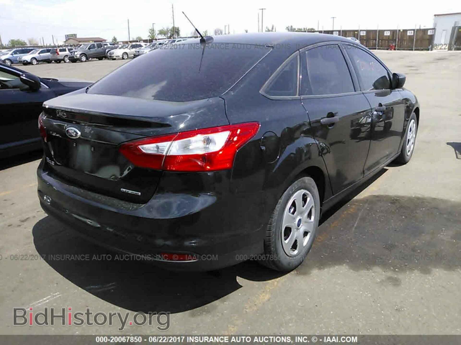 2014 Ford Focus - VIN: 1FADP3E29EL293580 - Photo 4