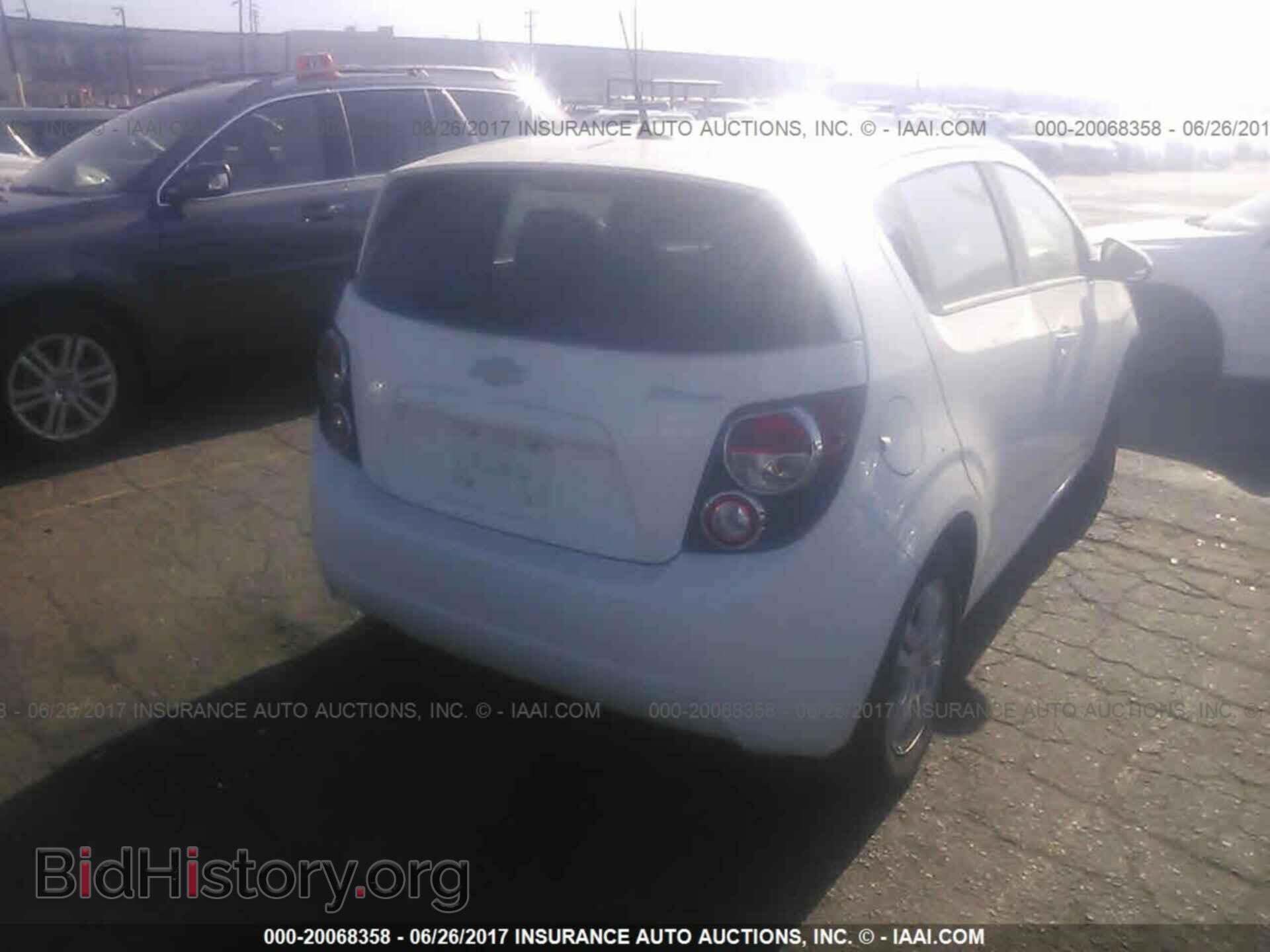2012 Chevrolet Sonic - VIN: 1G1JA6SH0C4114674 - Фото 4