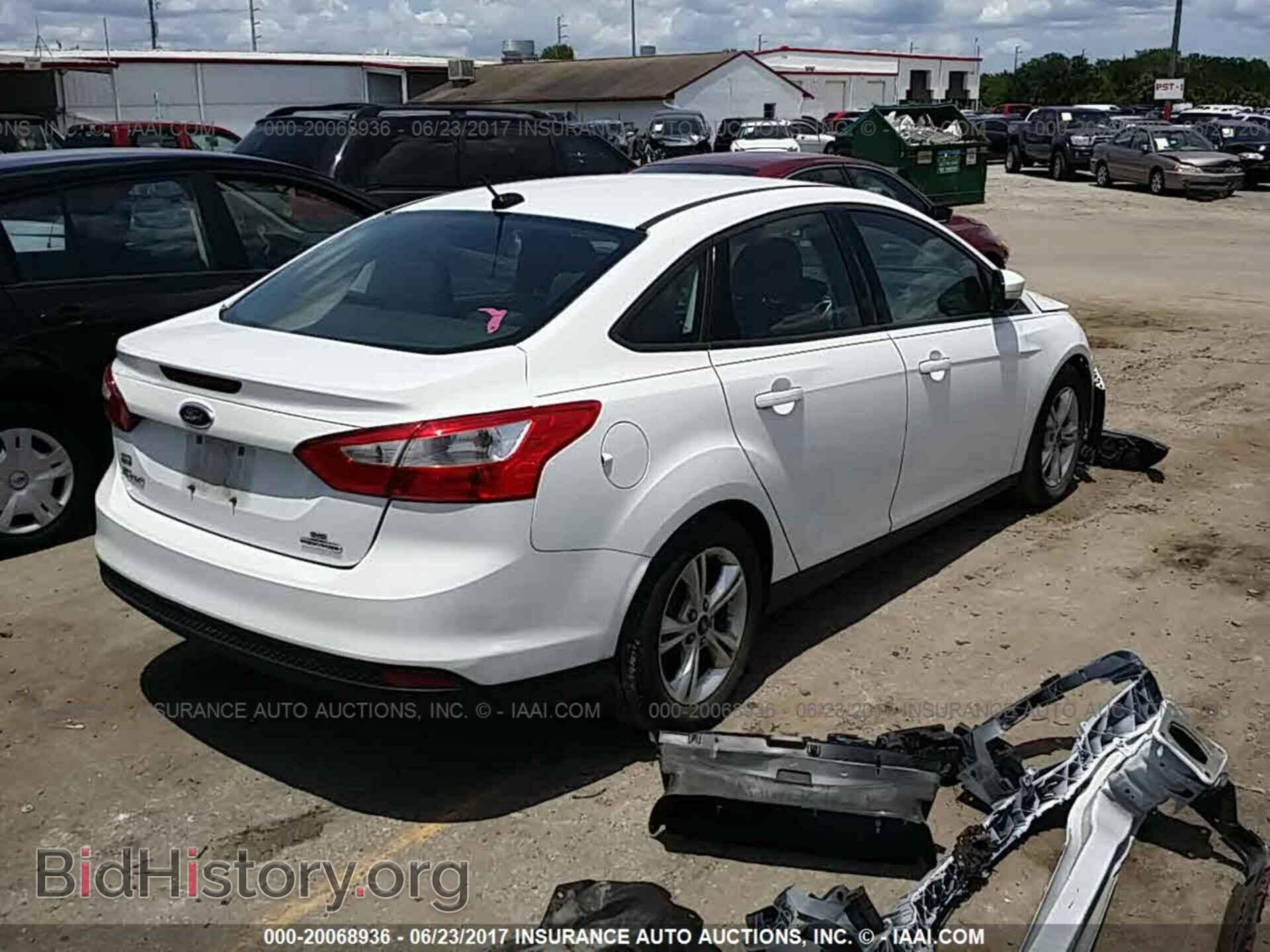 2014 Ford Focus - VIN: 1FADP3F2XEL170529 - Photo 4