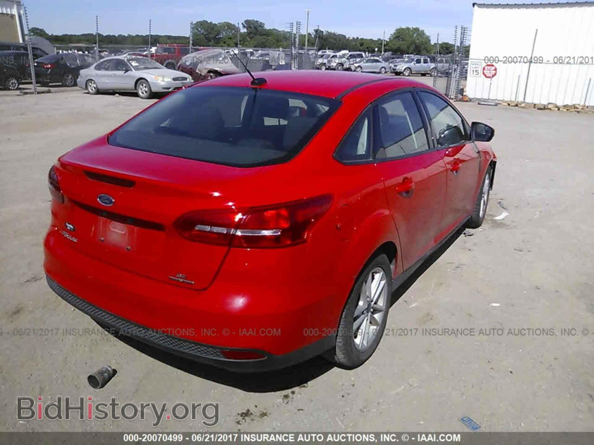 2015 Ford Focus - VIN: 1FADP3F20FL335747 - Photo 4