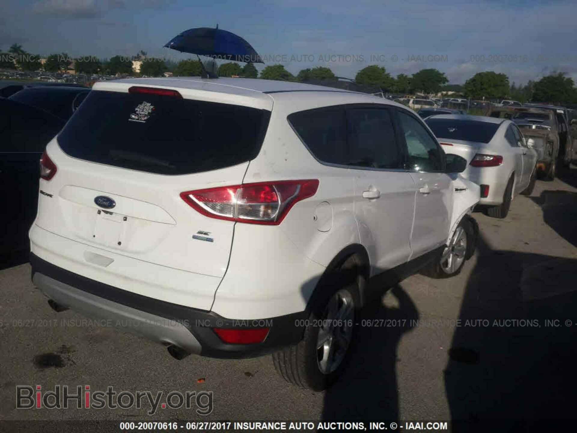 2014 Ford Escape - VIN: 1FMCU9GX1EUB09443 - Photo 4