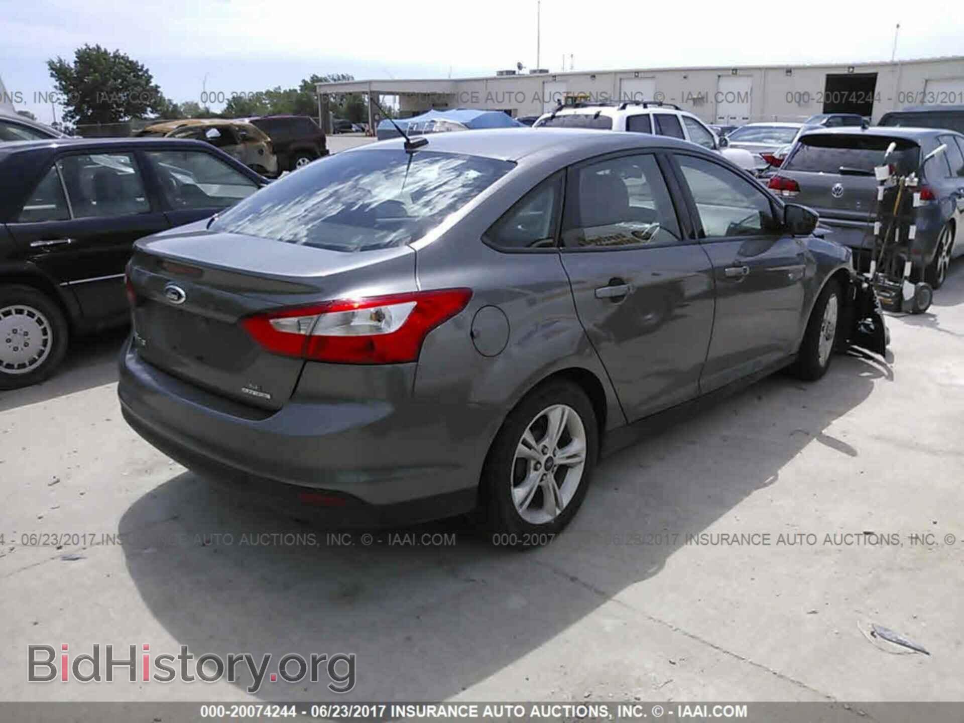 2014 Ford Focus - VIN: 1FADP3F25EL322748 - Photo 4