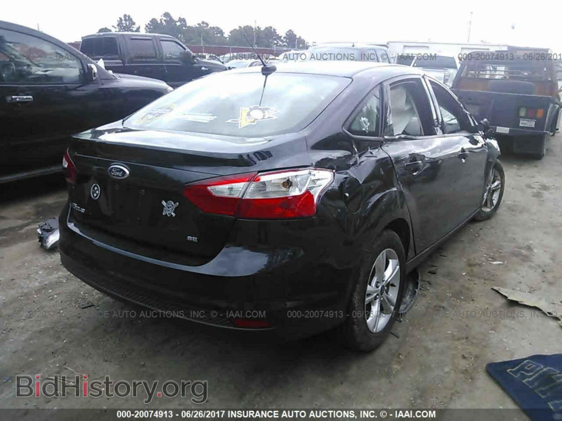 2014 Ford Focus - VIN: 1FADP3F20EL238417 - Фото 4