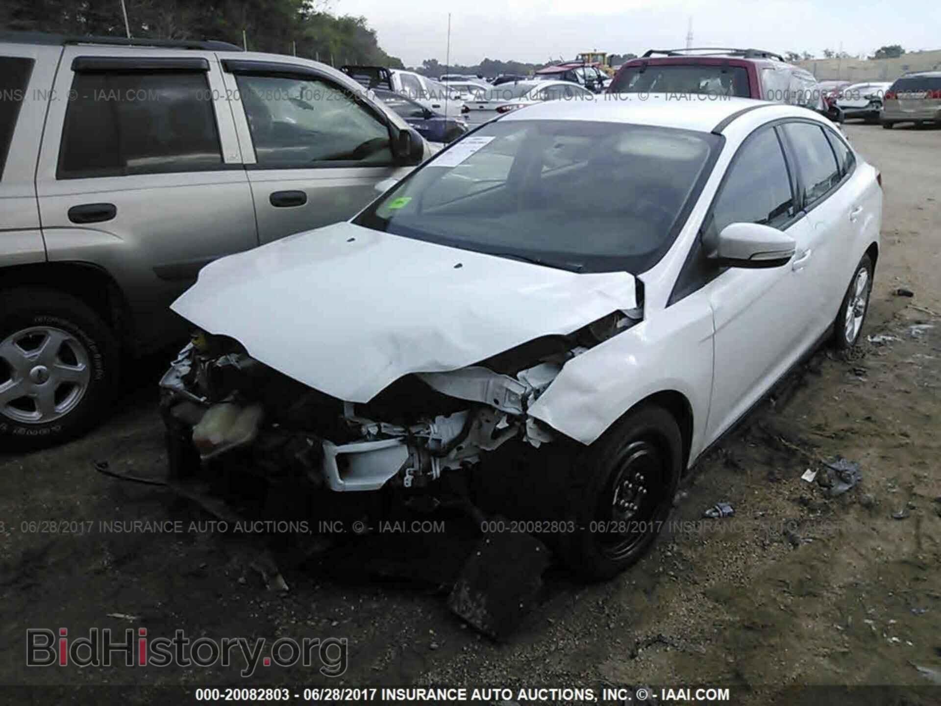 2014 Ford Focus - VIN: 1FADP3F23EL149375 - Фото 2