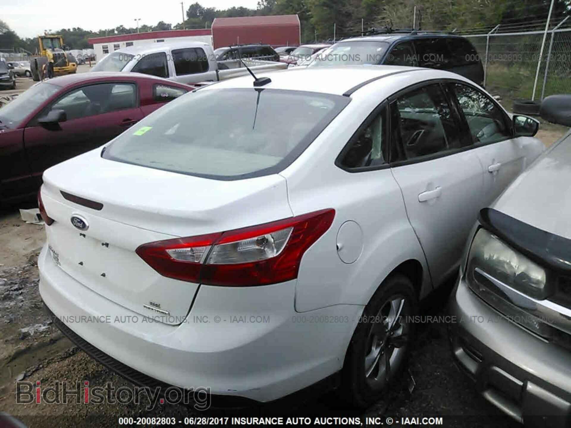 2014 Ford Focus - VIN: 1FADP3F23EL149375 - Фото 4