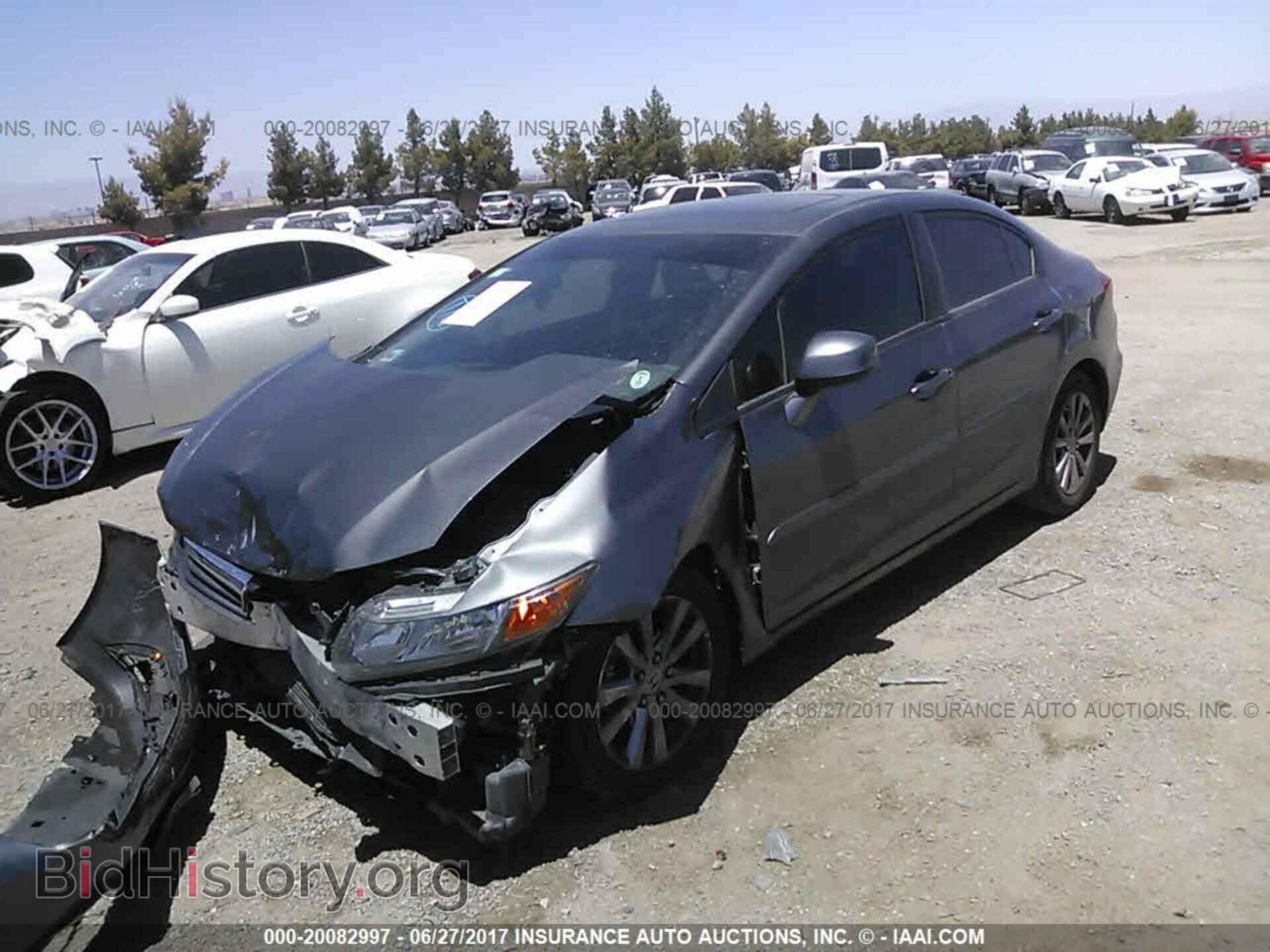 2012 Honda Civic - VIN: 2HGFB2F80CH599738 - Photo 2