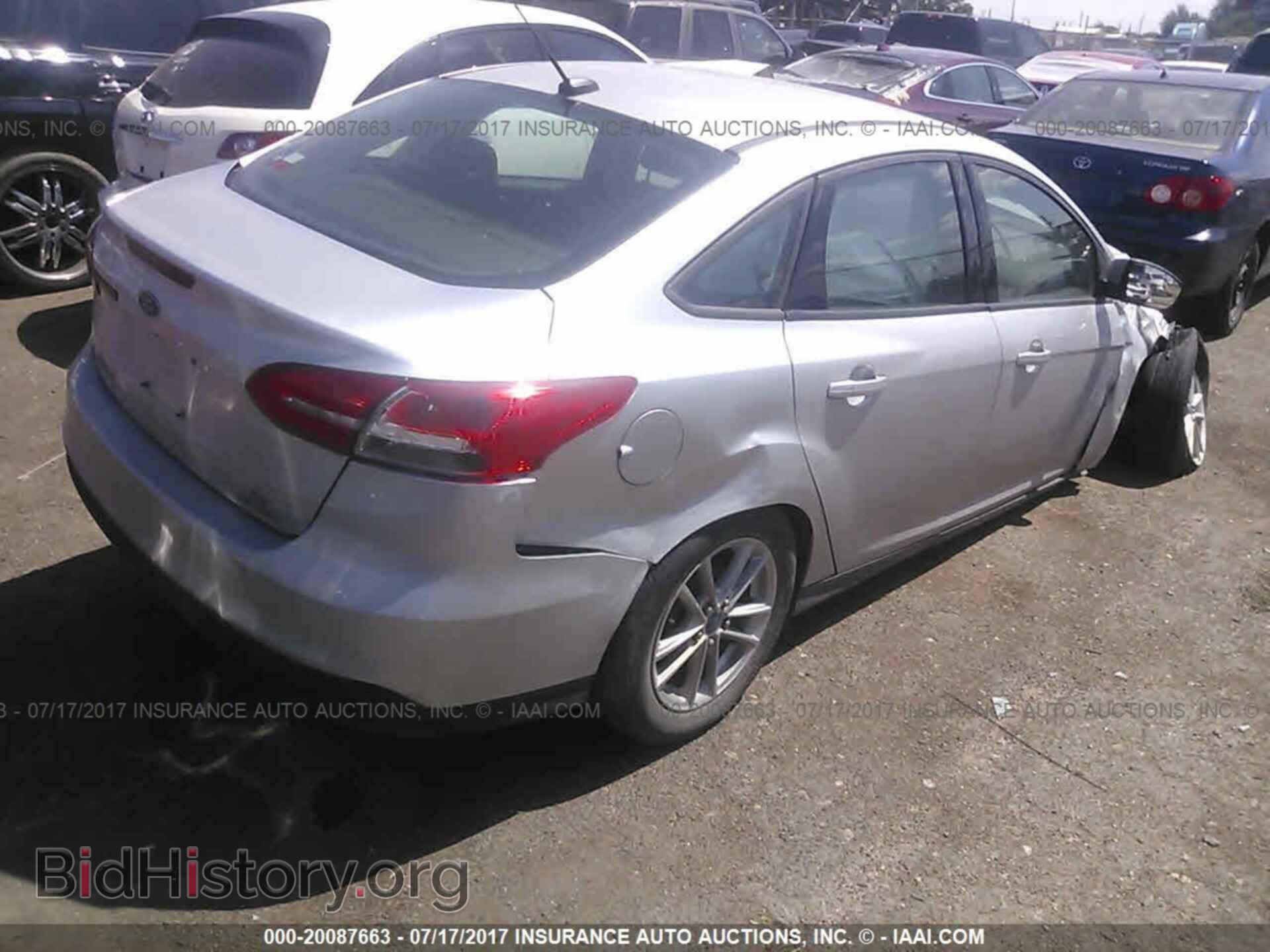 2015 Ford Focus - VIN: 1FADP3F24FL357024 - Photo 4