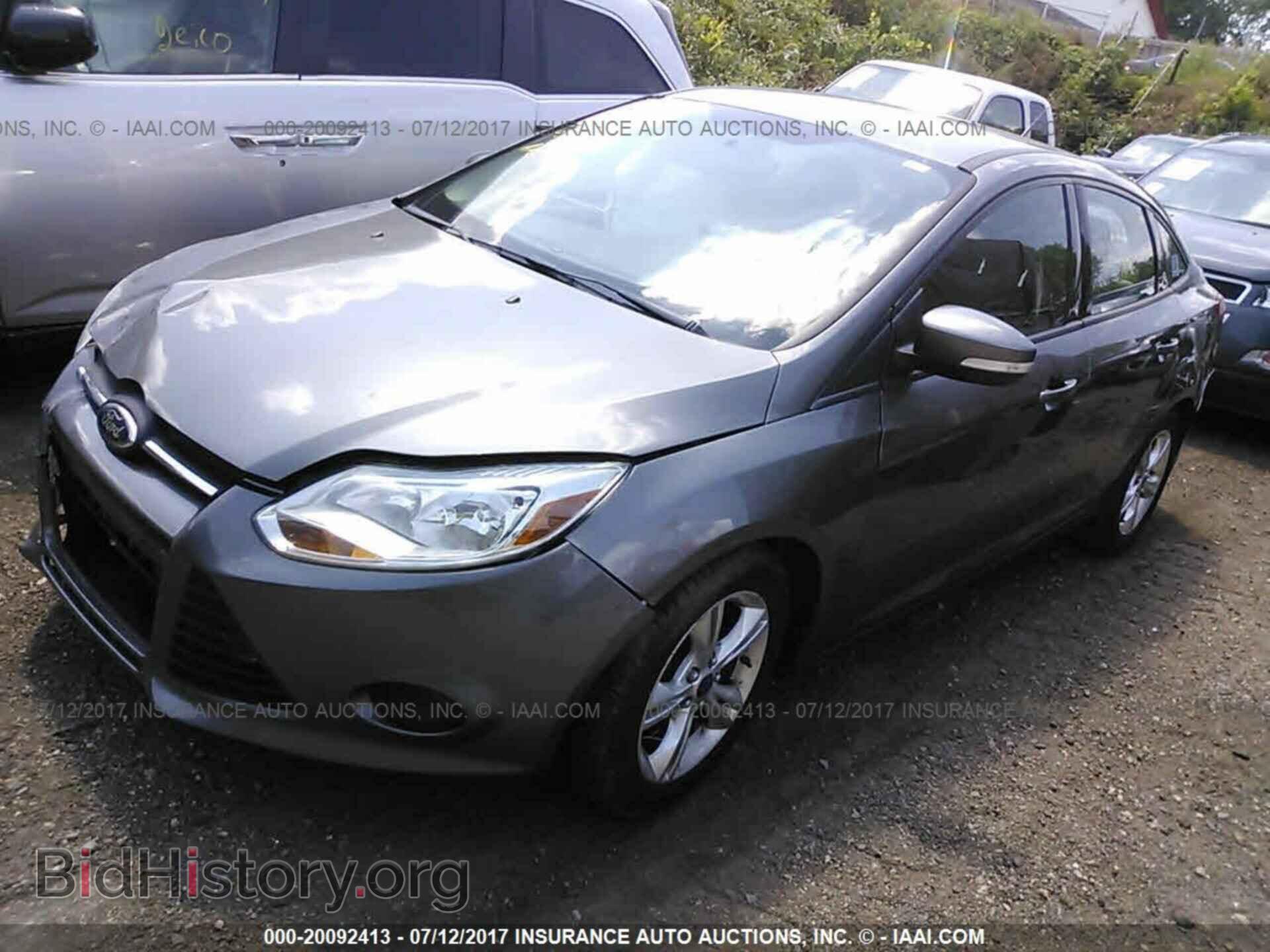 2014 Ford Focus - VIN: 1FADP3F20EL131397 - Фото 2