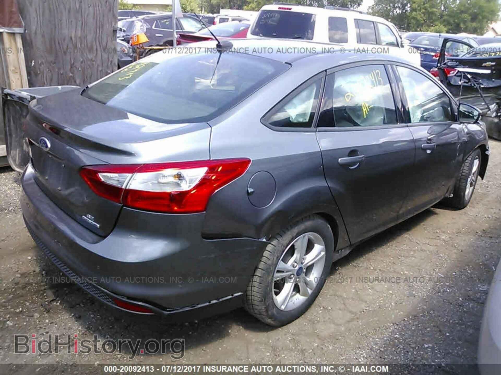 2014 Ford Focus - VIN: 1FADP3F20EL131397 - Фото 4