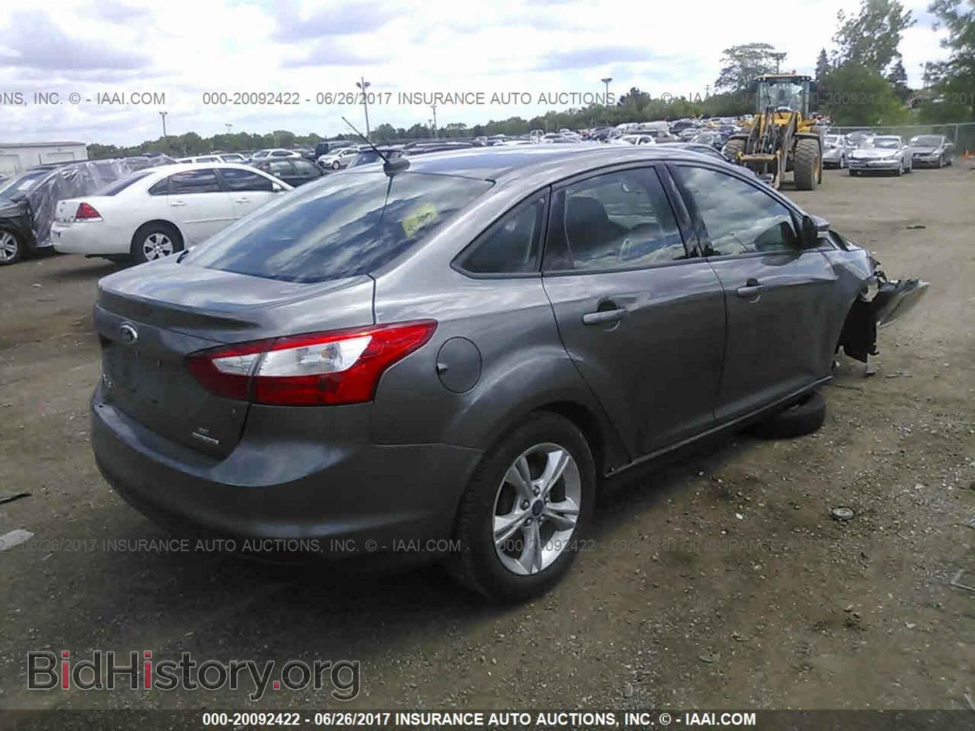 2014 Ford Focus - VIN: 1FADP3F21EL244744 - Фото 4