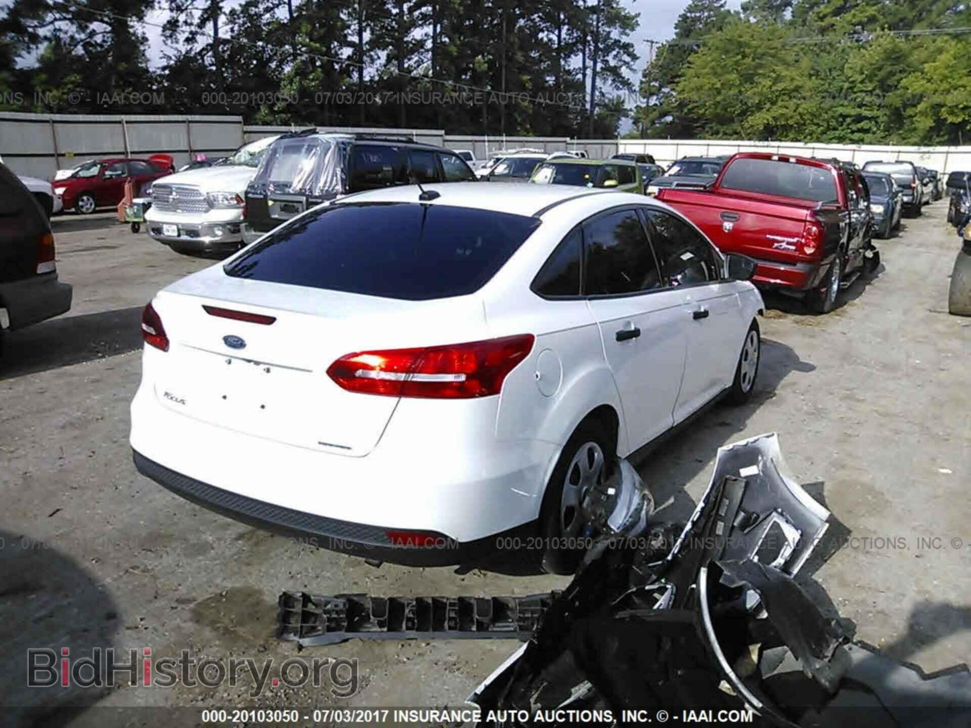 2015 Ford Focus - VIN: 1FADP3E25FL384959 - Photo 4