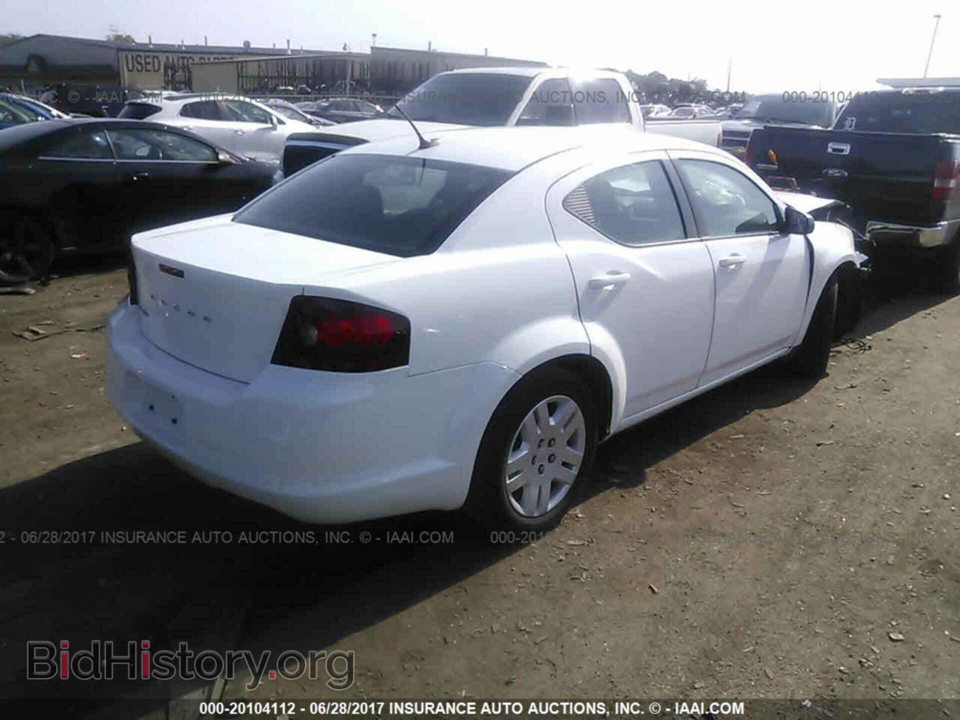 2014 Dodge Avenger - VIN: 1C3CDZABXEN175697 - Photo 4