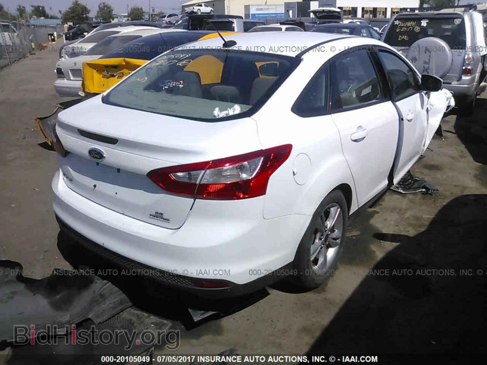 2014 Ford Focus - VIN: 1FADP3F29EL272274 - Фото 4