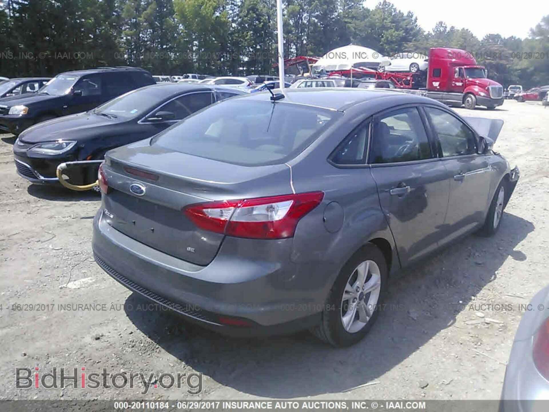 2014 Ford Focus - VIN: 1FADP3F26EL457141 - Фото 4