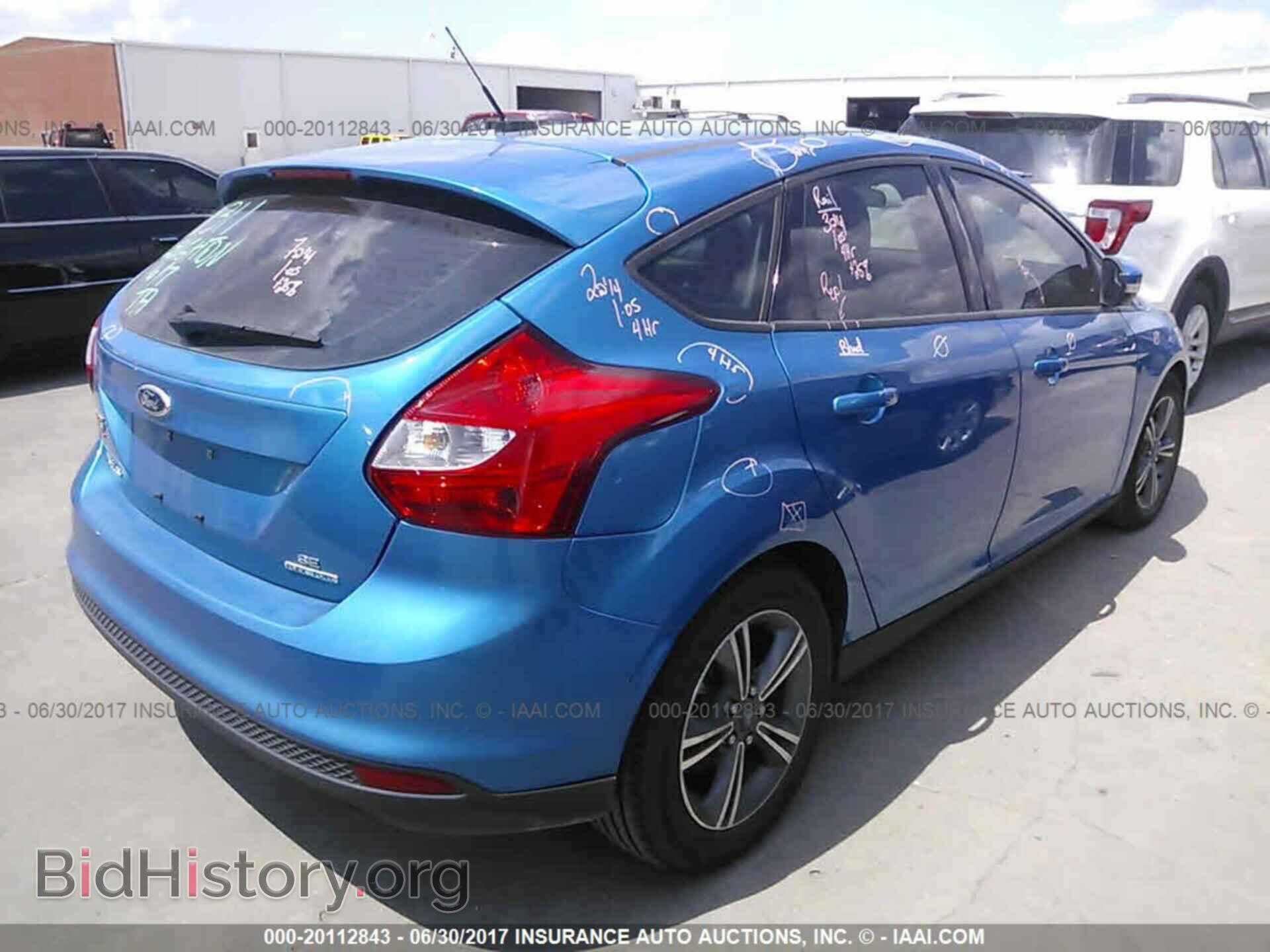 2014 Ford Focus - VIN: 1FADP3K21EL354957 - Photo 4