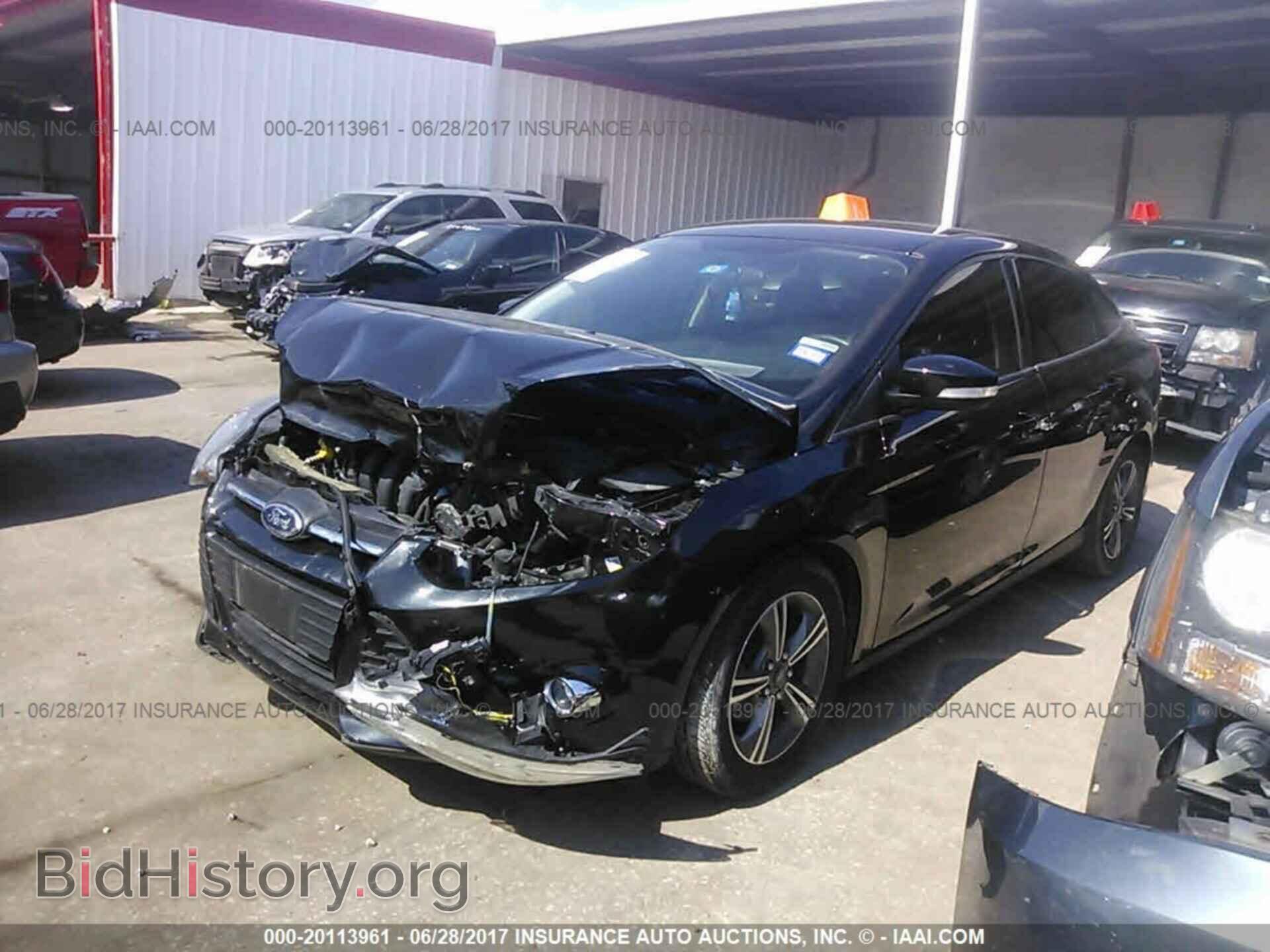 2014 Ford Focus - VIN: 1FADP3F24EL168128 - Фото 2