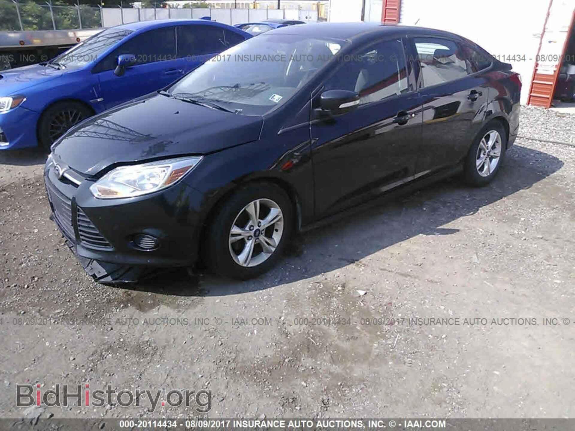 2014 Ford Focus - VIN: 1FADP3F21EL136592 - Photo 2