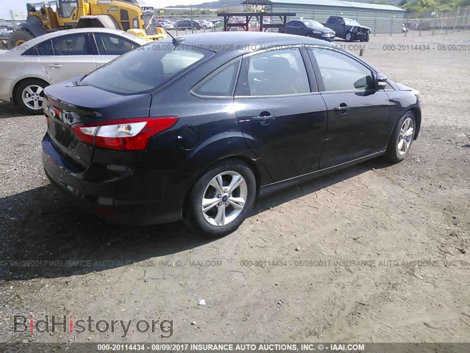 2014 Ford Focus - VIN: 1FADP3F21EL136592 - Photo 4