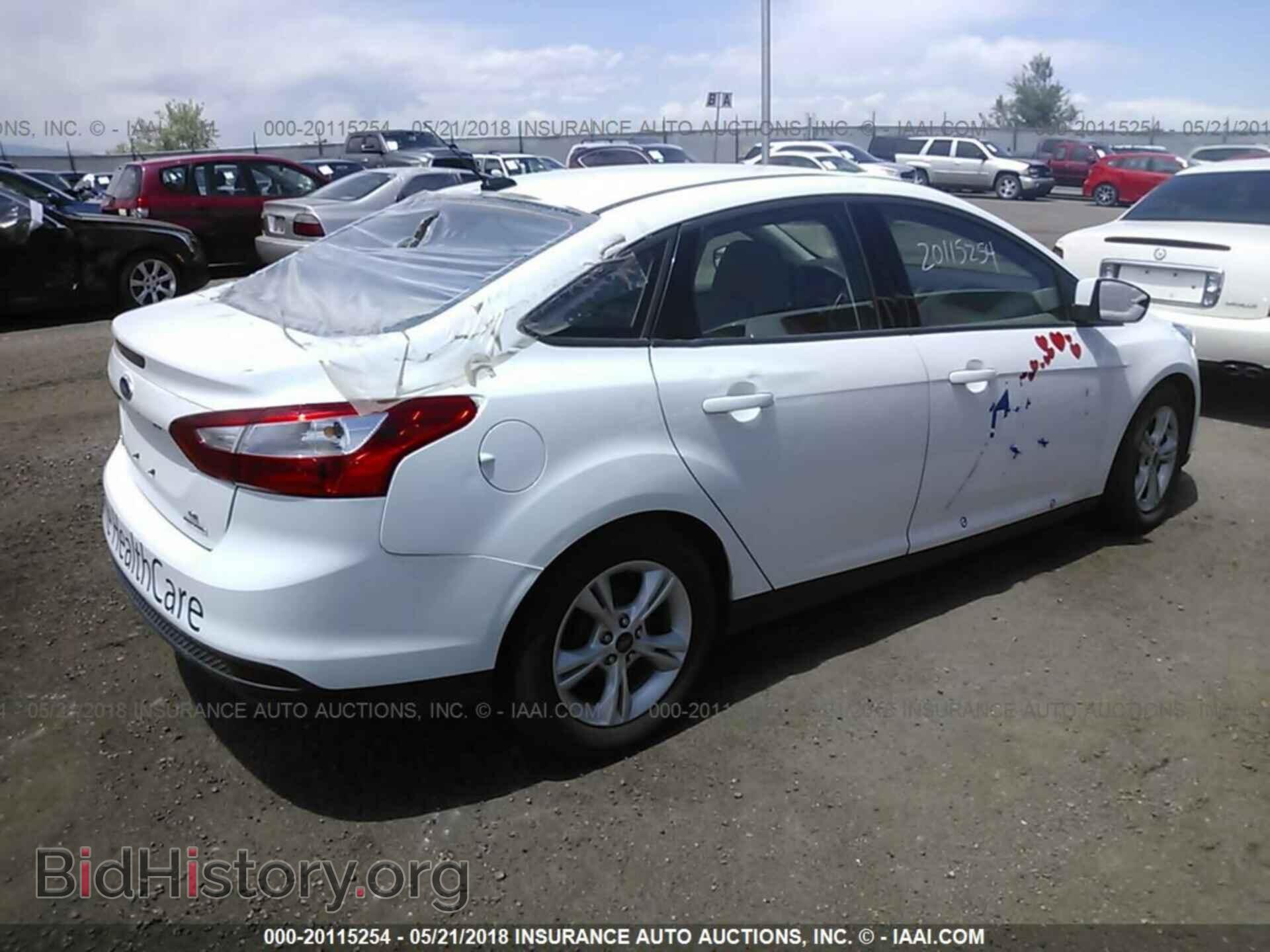 2014 Ford Focus - VIN: 1FADP3F2XEL431366 - Photo 4
