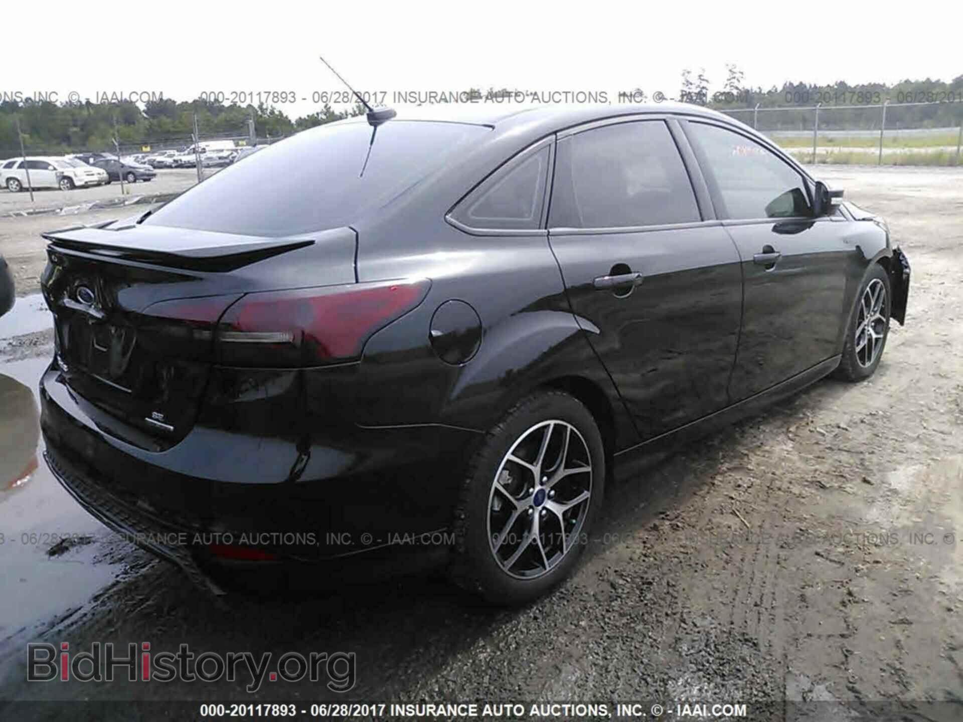 2015 Ford Focus - VIN: 1FADP3F24FL209312 - Фото 4