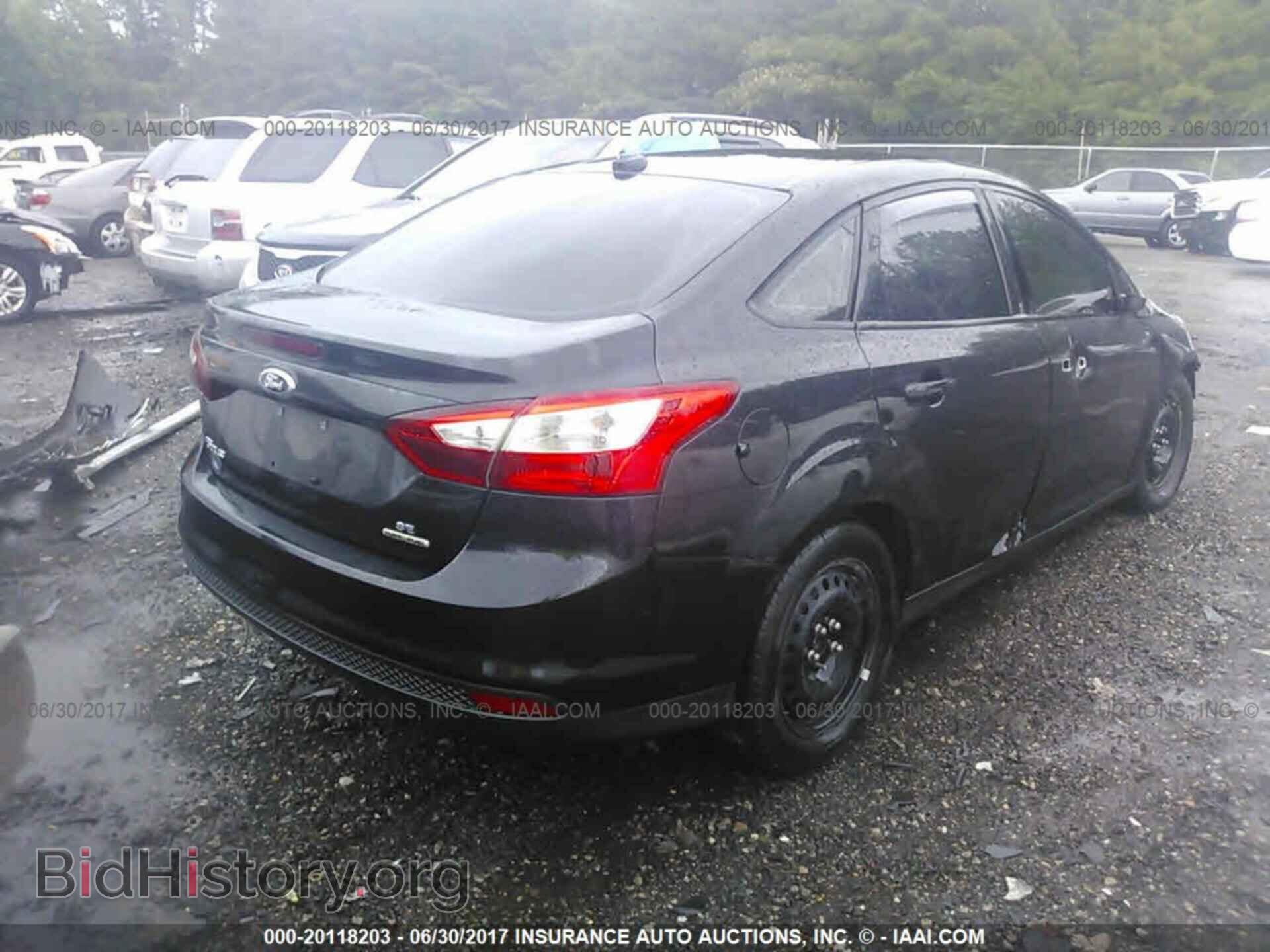 2012 Ford Focus - VIN: 1FAHP3F28CL369870 - Photo 4