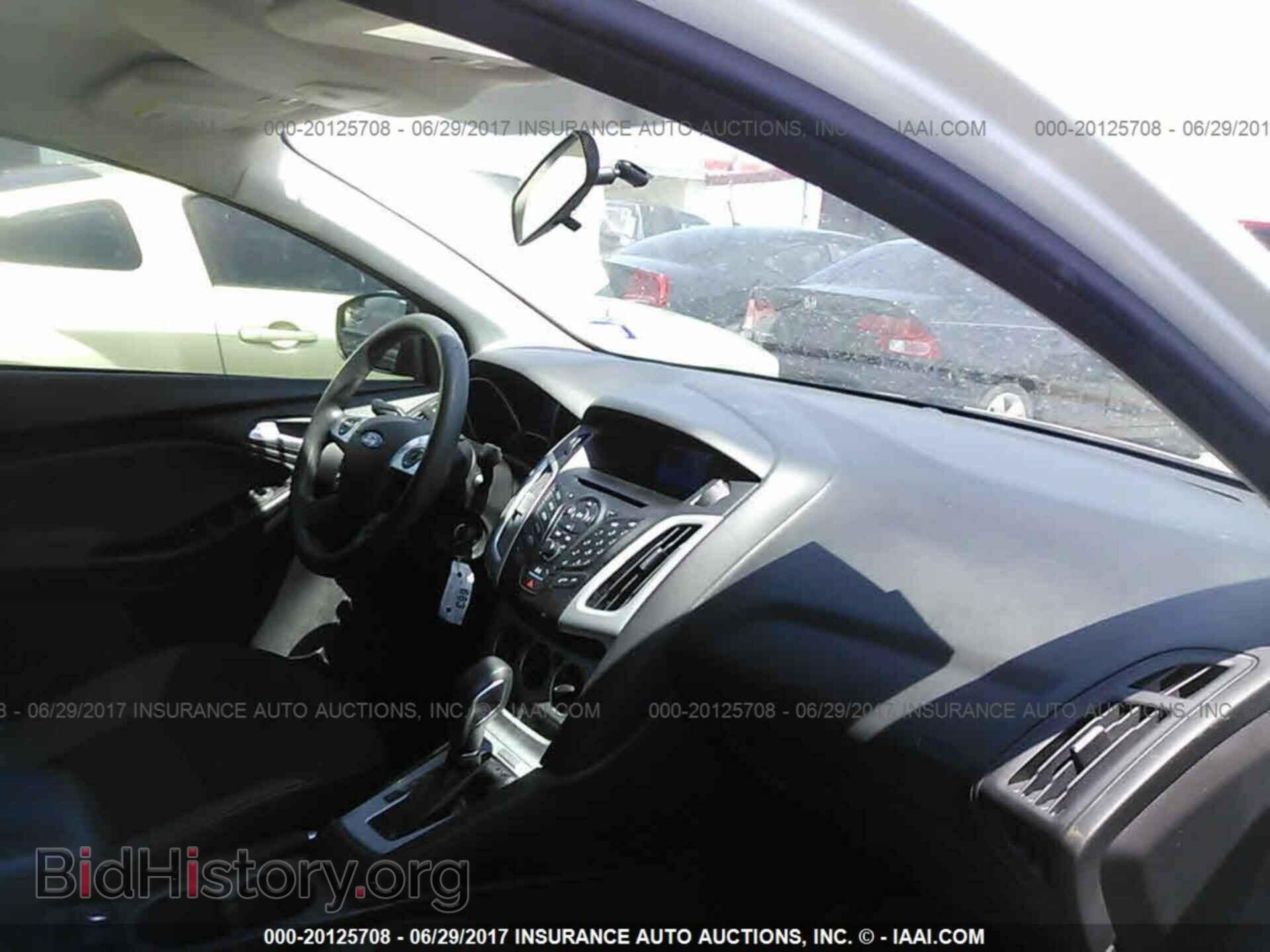 2014 Ford Focus - VIN: 1FADP3F20EL109402 - Фото 5