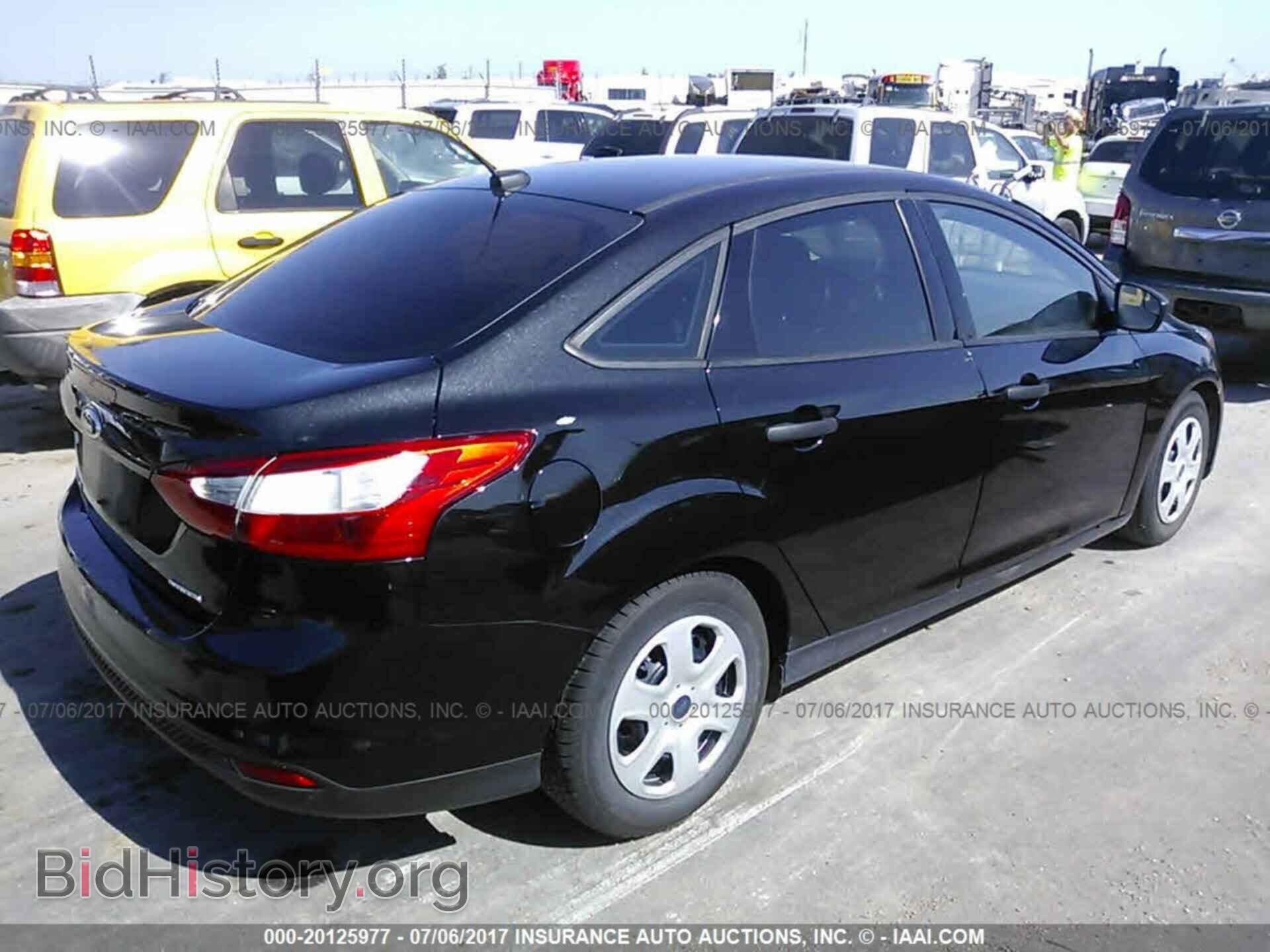 2014 Ford Focus - VIN: 1FADP3E25EL373524 - Фото 4