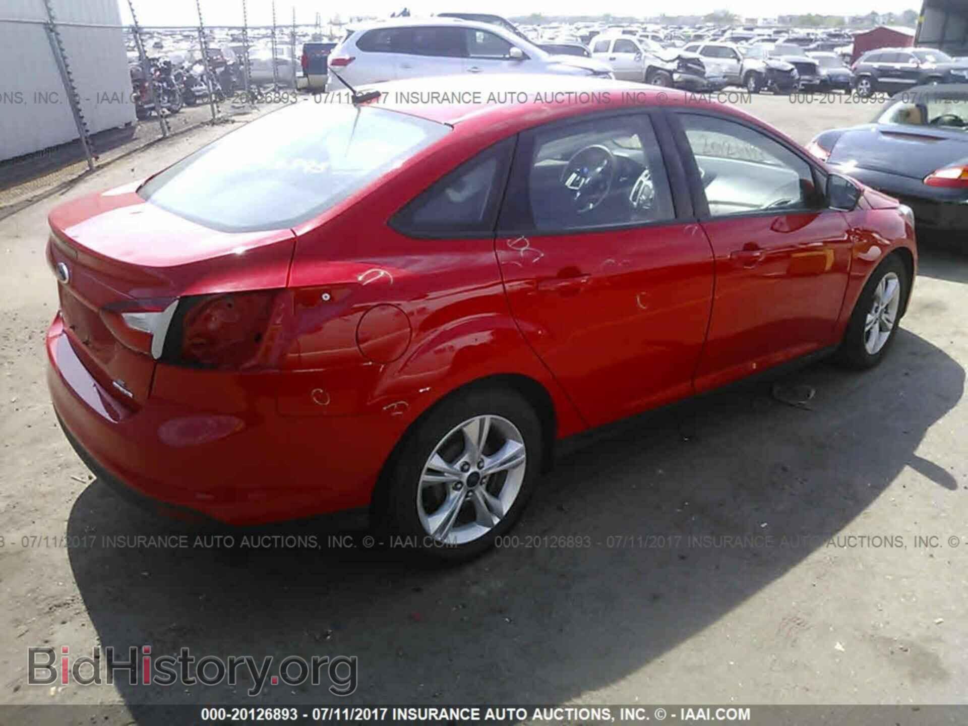 2014 Ford Focus - VIN: 1FADP3F20EL373641 - Фото 4