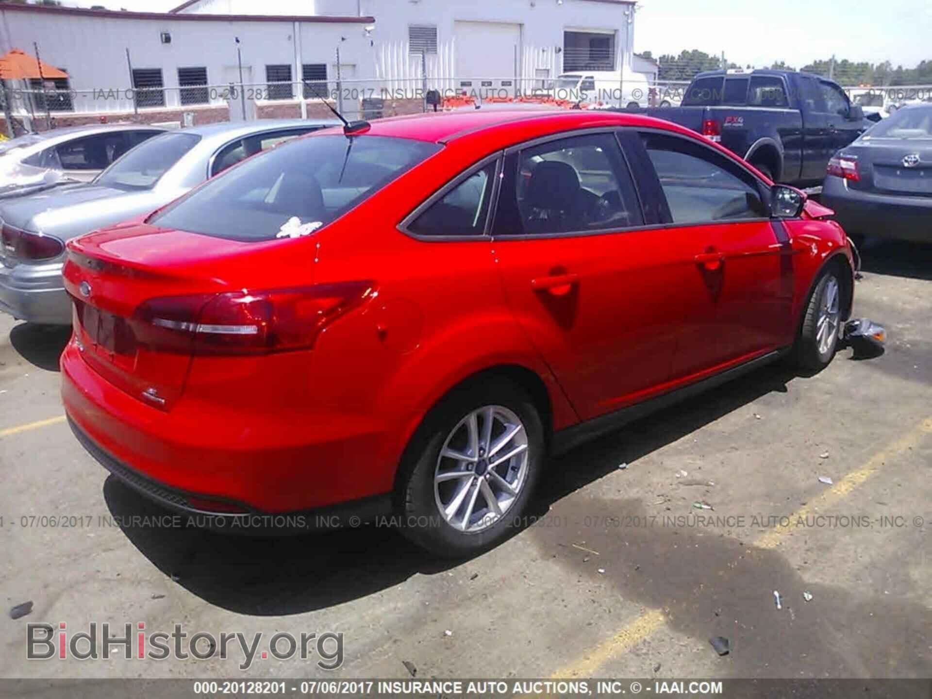 2015 Ford Focus - VIN: 1FADP3F25FL316529 - Photo 4