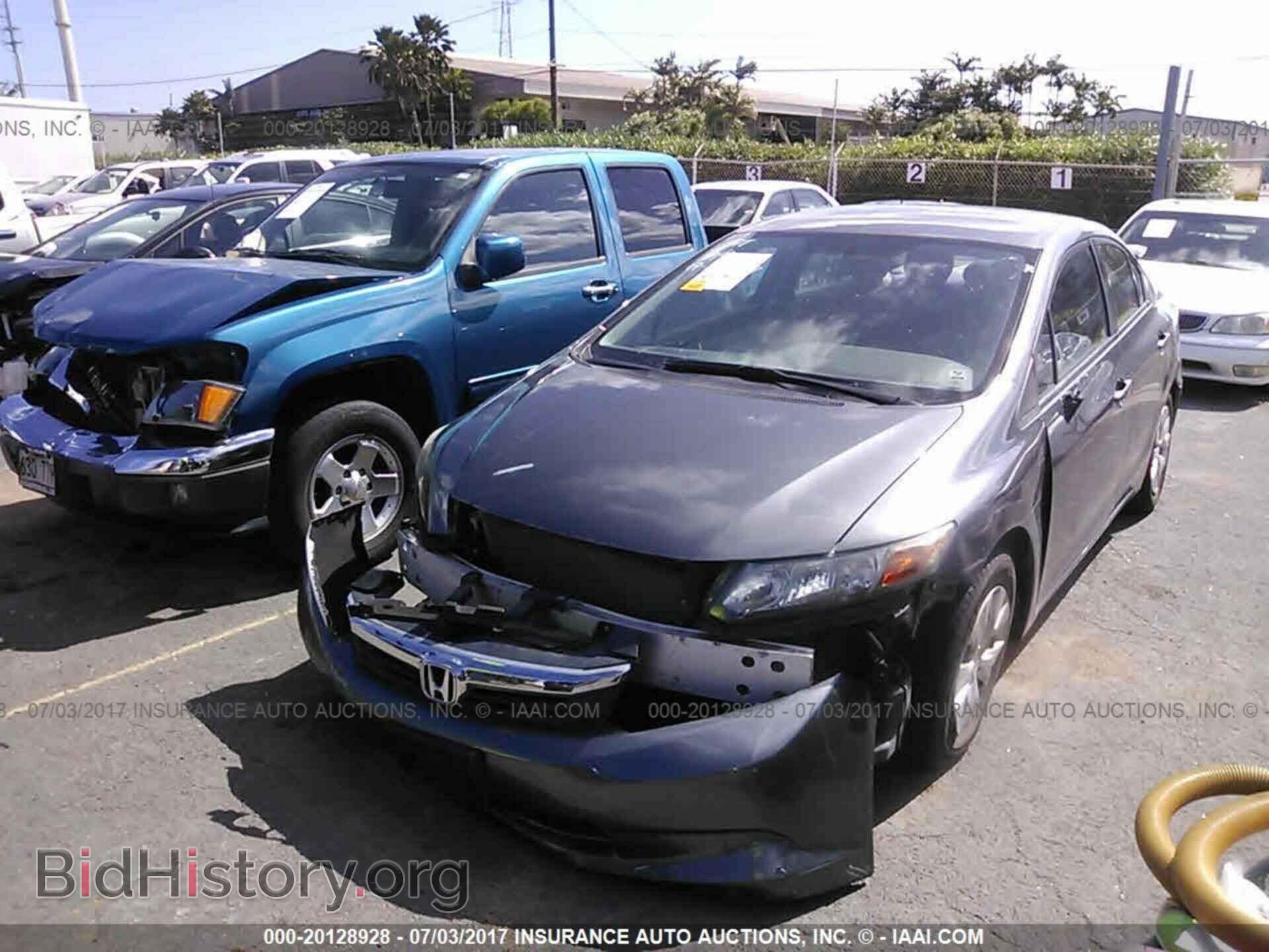 2012 Honda Civic - VIN: 2HGFB2F55CH302498 - Photo 2