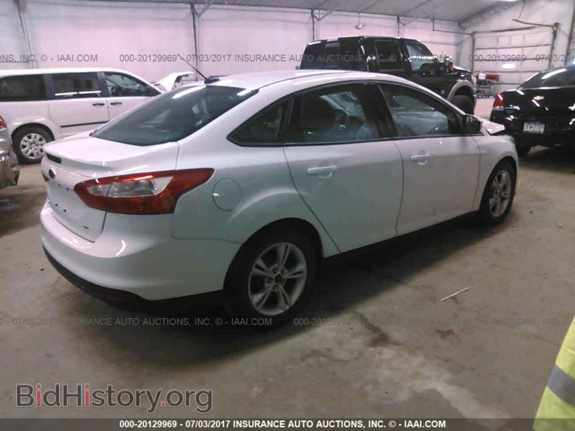 2014 Ford Focus - VIN: 1FADP3F23EL370376 - Photo 4