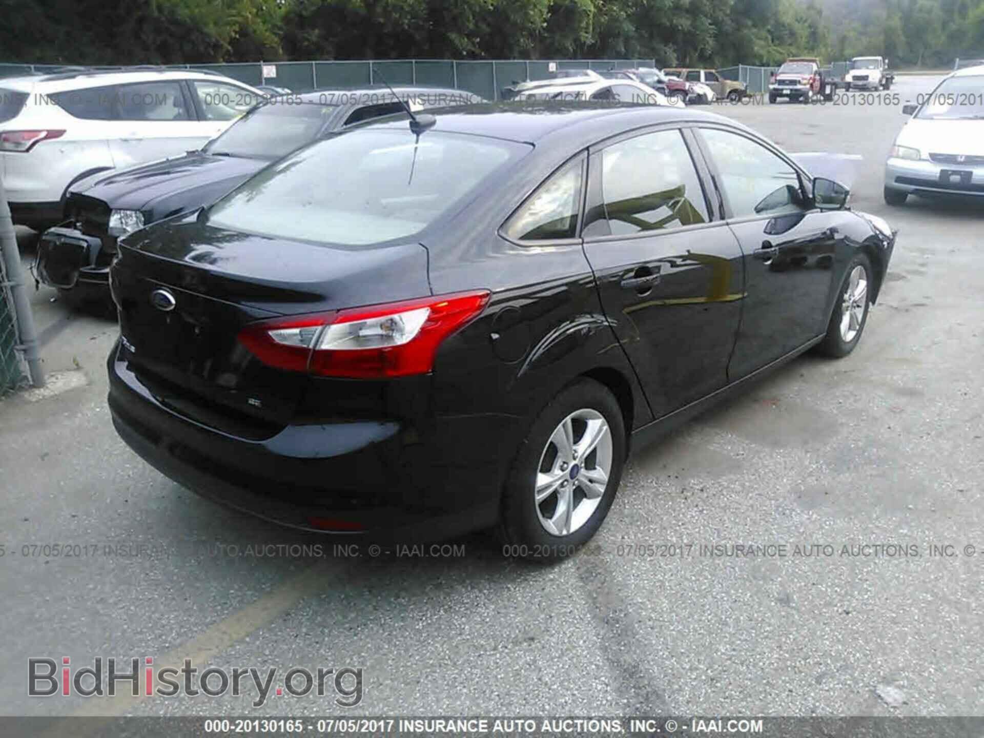 2014 Ford Focus - VIN: 1FADP3F22EL308855 - Photo 4
