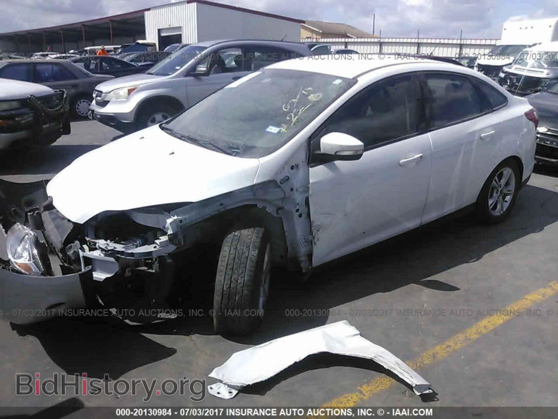 2014 Ford Focus - VIN: 1FADP3F20EL109240 - Фото 2