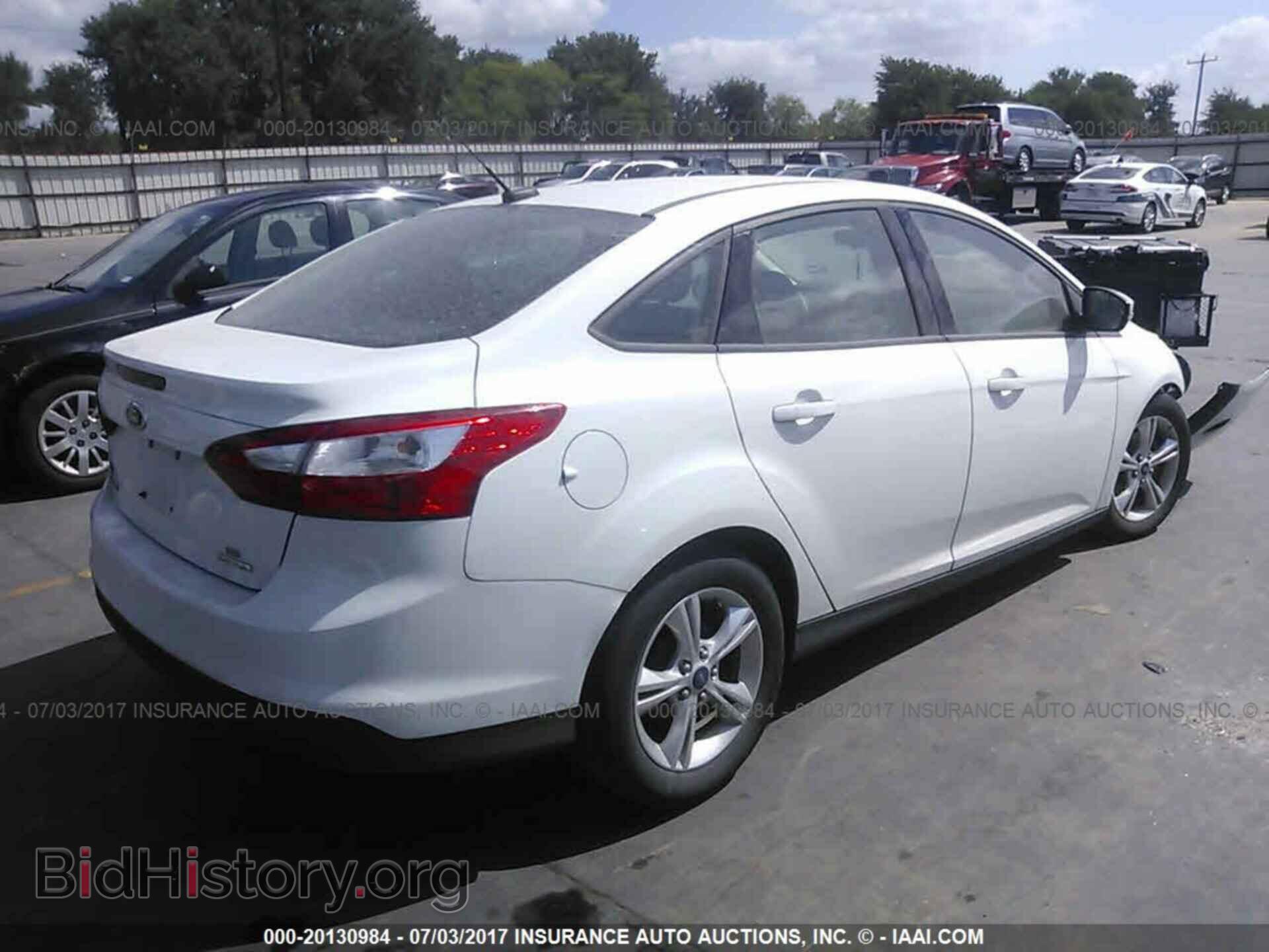 2014 Ford Focus - VIN: 1FADP3F20EL109240 - Фото 4