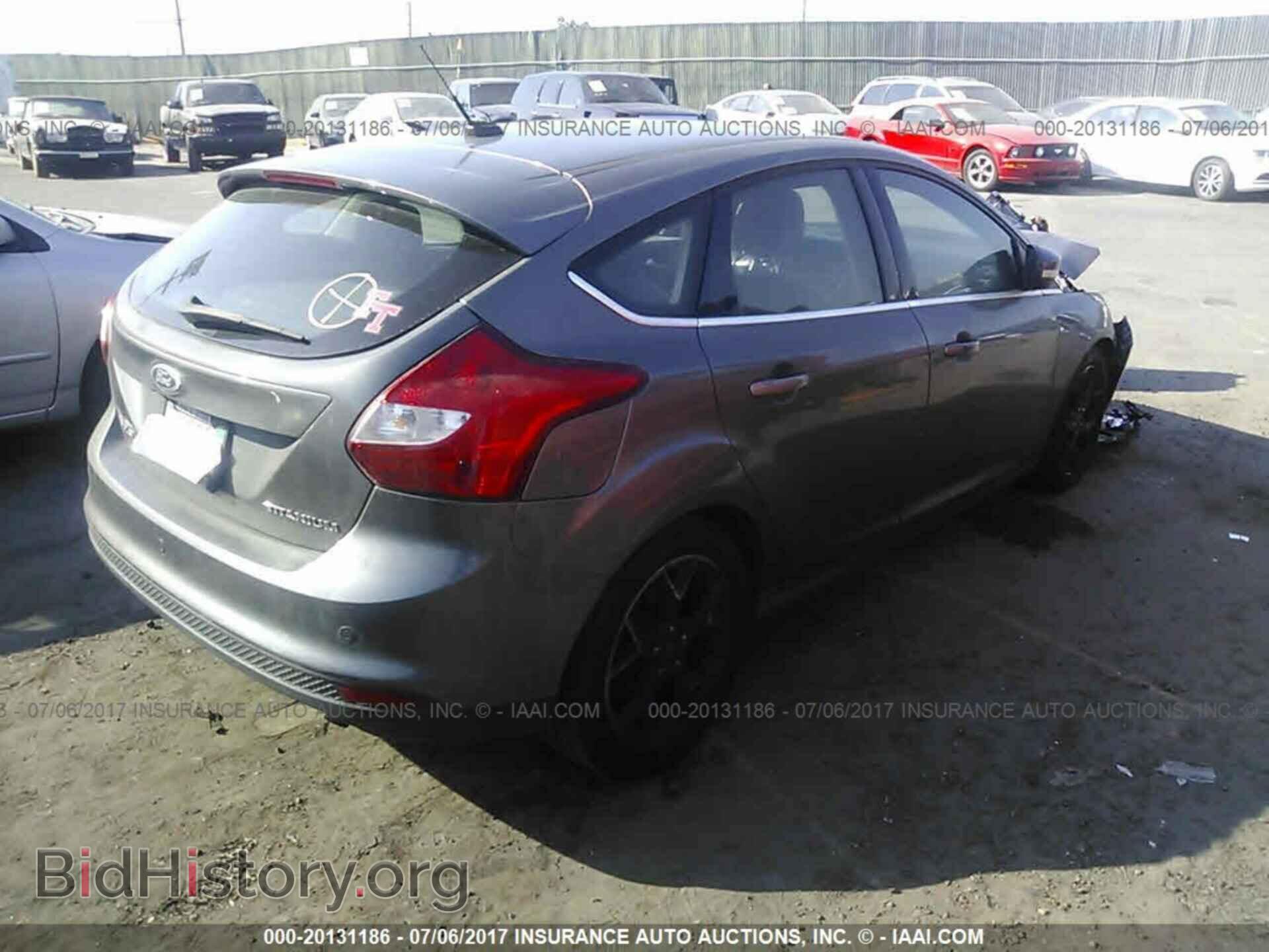 2012 Ford Focus - VIN: 1FAHP3N2XCL267875 - Photo 4