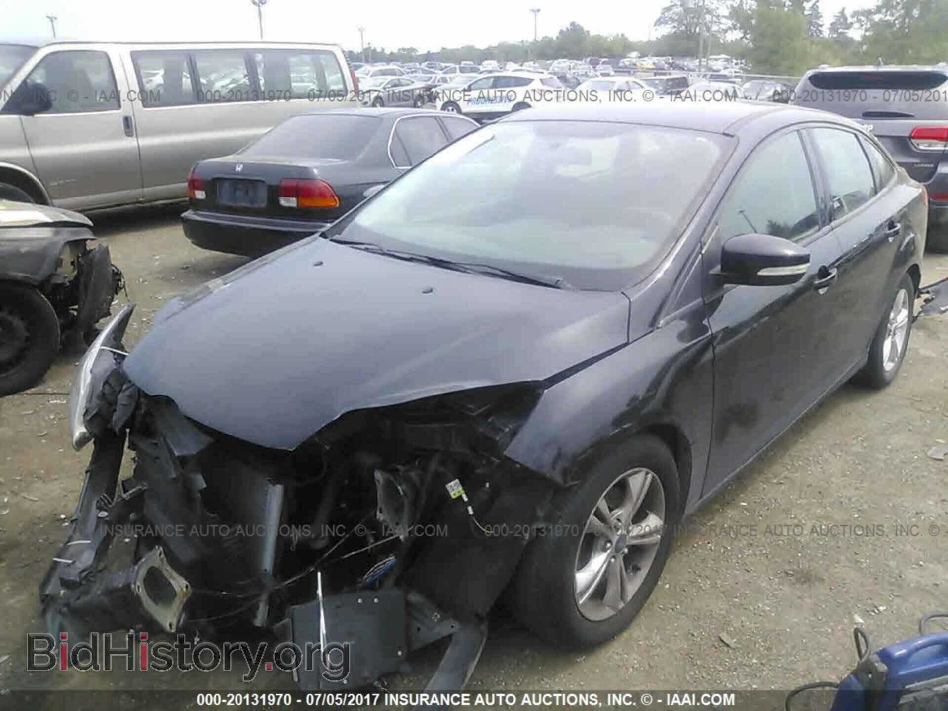 2014 Ford Focus - VIN: 1FADP3F28EL147802 - Photo 2