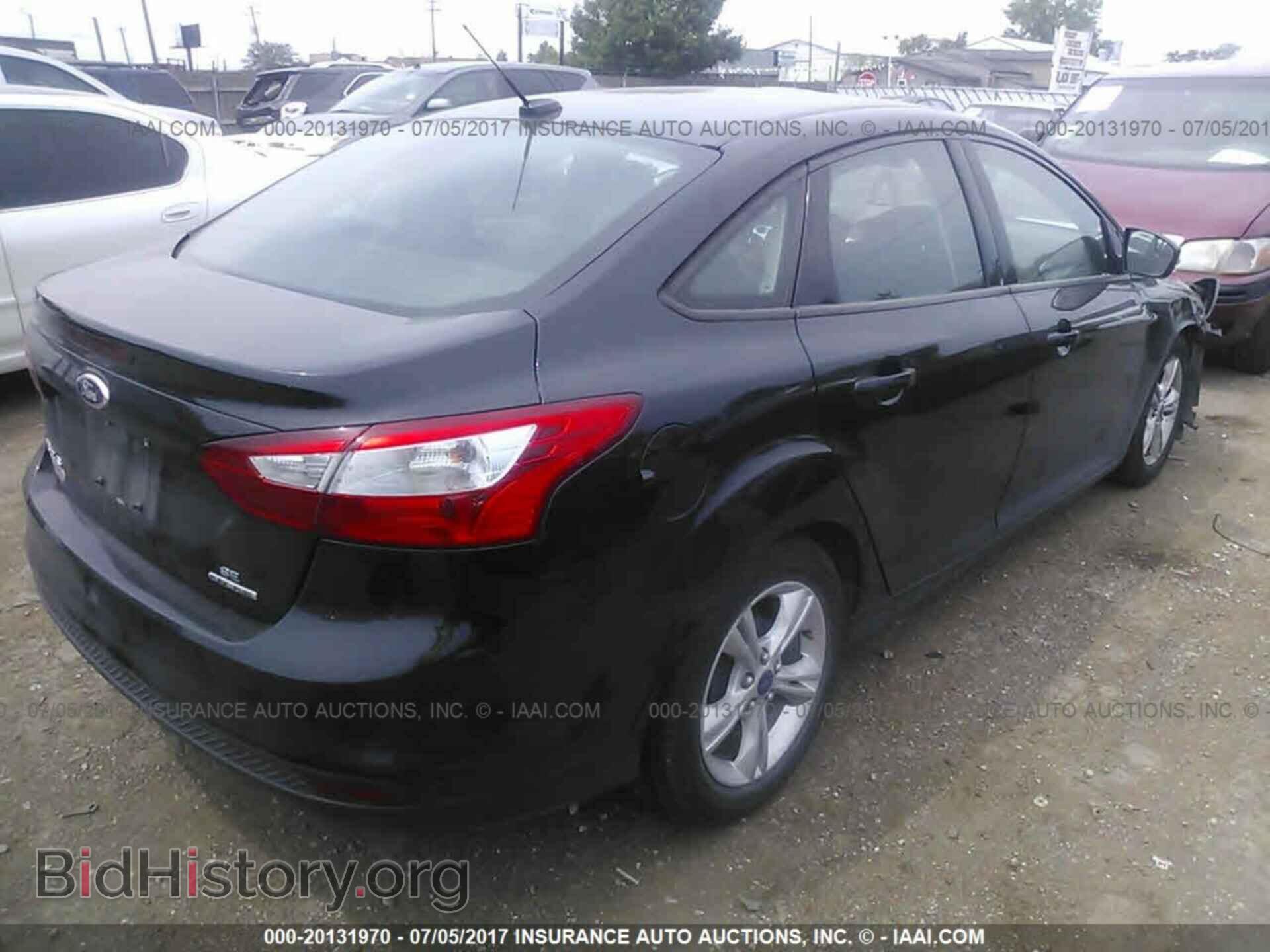 2014 Ford Focus - VIN: 1FADP3F28EL147802 - Photo 4