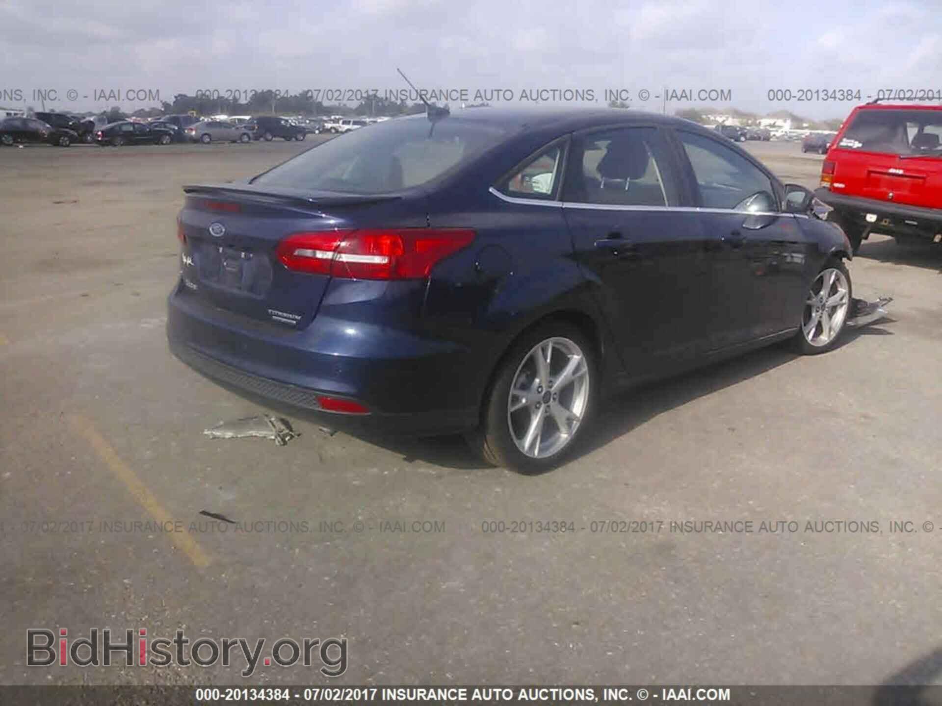 2016 Ford Focus - VIN: 1FADP3J2XGL378985 - Photo 4