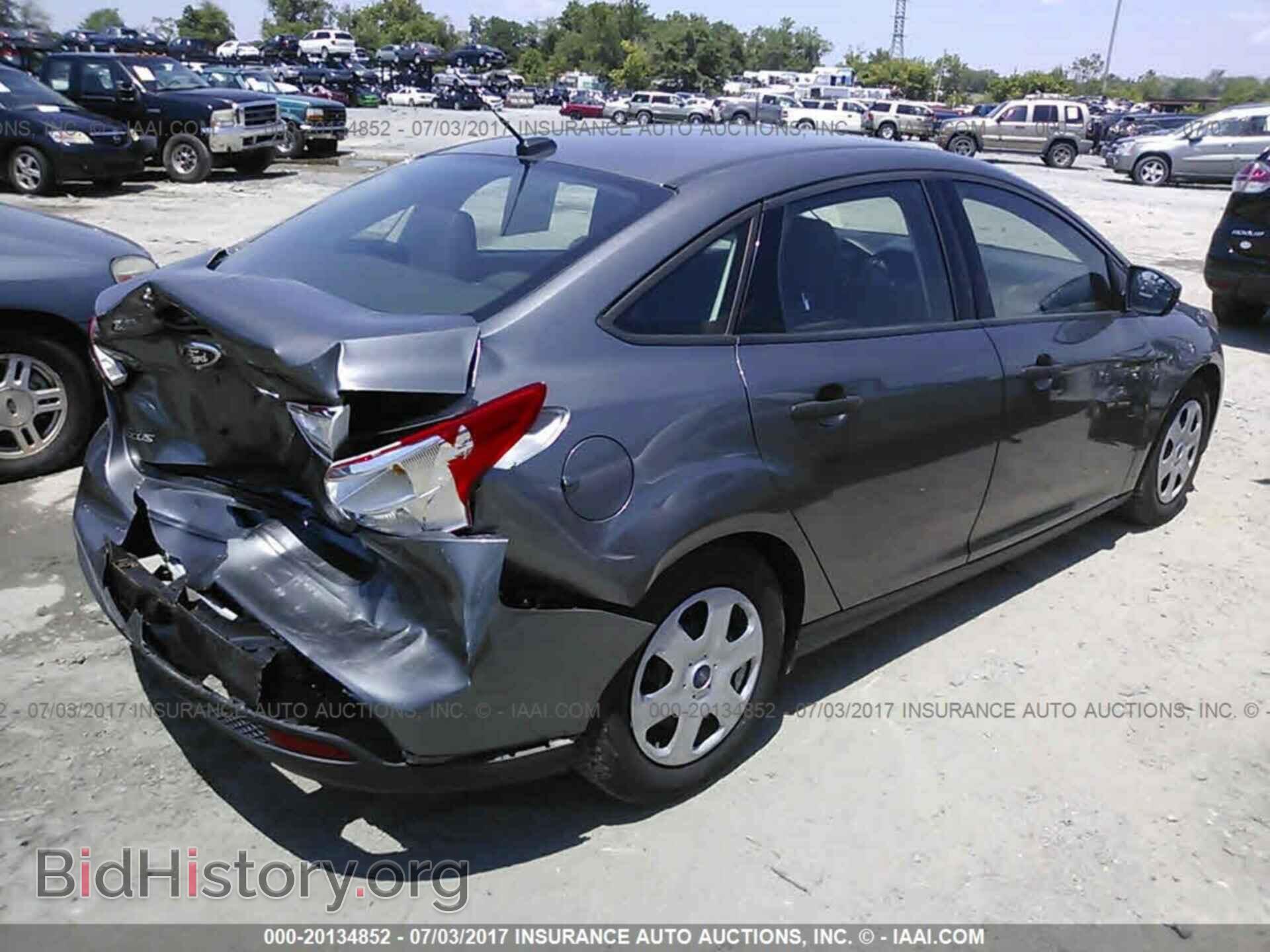 2014 Ford Focus - VIN: 1FADP3E28EL171213 - Фото 4