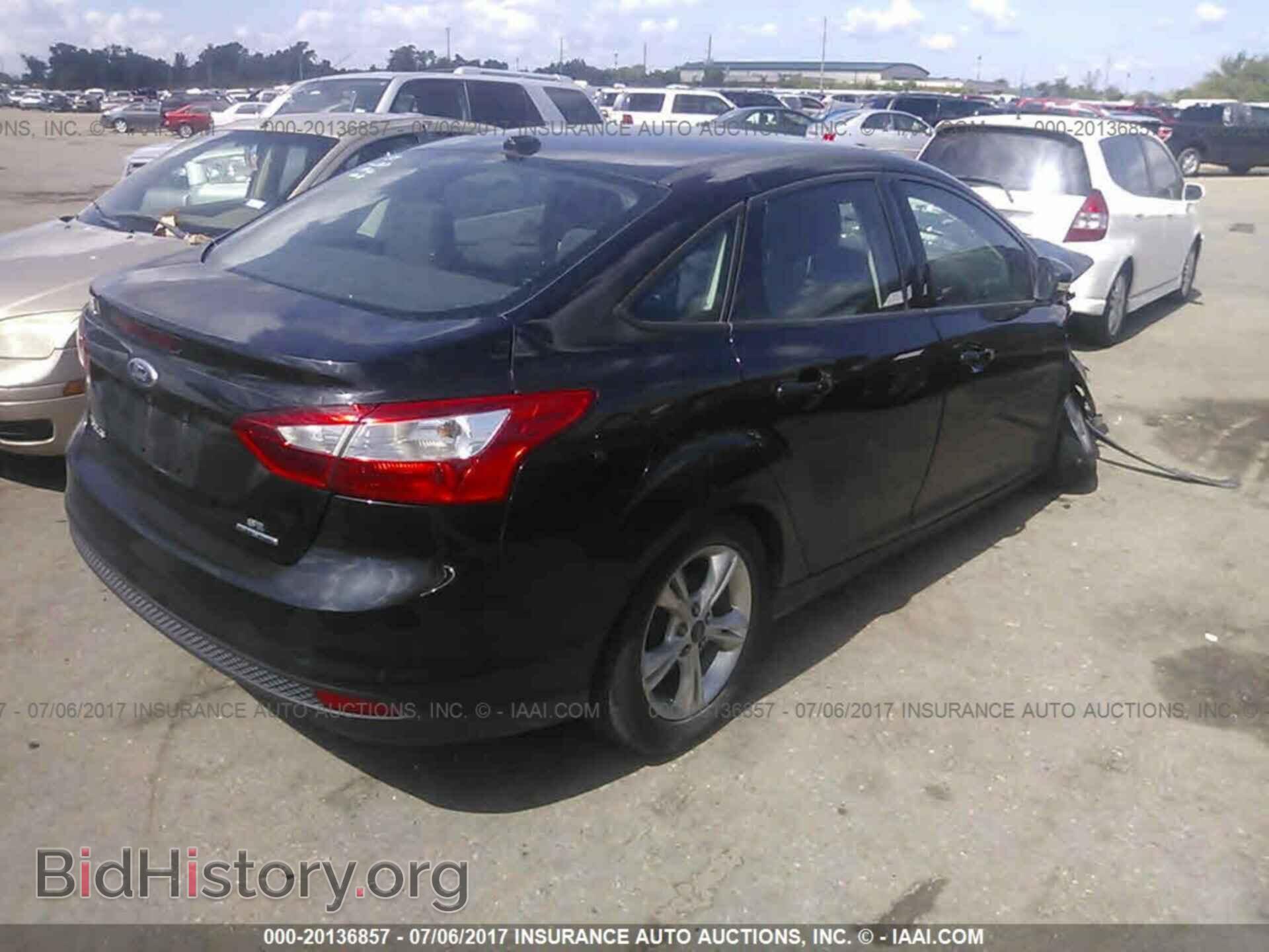 2014 Ford Focus - VIN: 1FADP3F22EL229332 - Фото 4