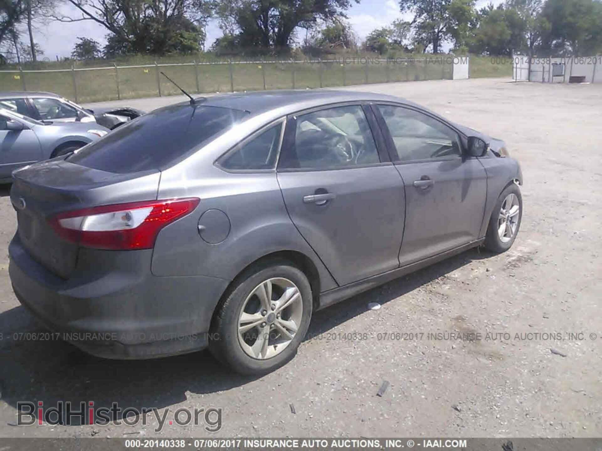 2014 Ford Focus - VIN: 1FADP3F28EL138971 - Фото 4