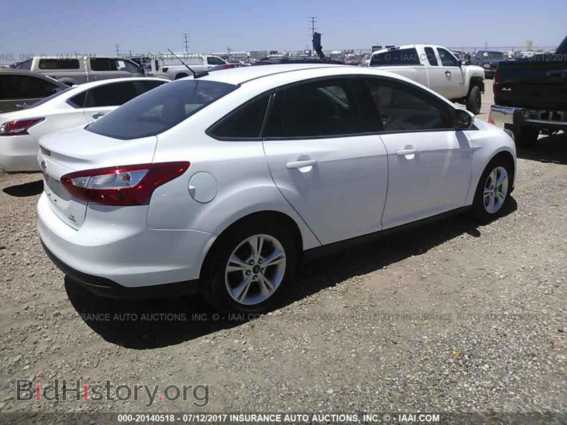 2014 Ford Focus - VIN: 1FADP3F25EL363042 - Photo 4