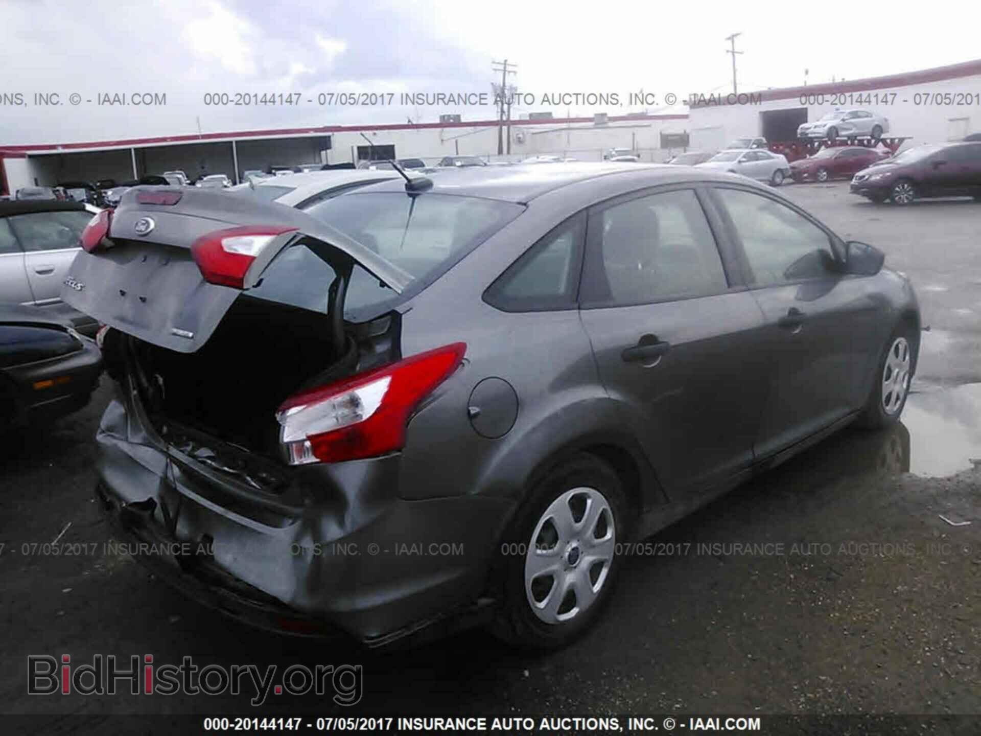 2013 Ford Focus - VIN: 1FADP3E22DL306927 - Photo 4
