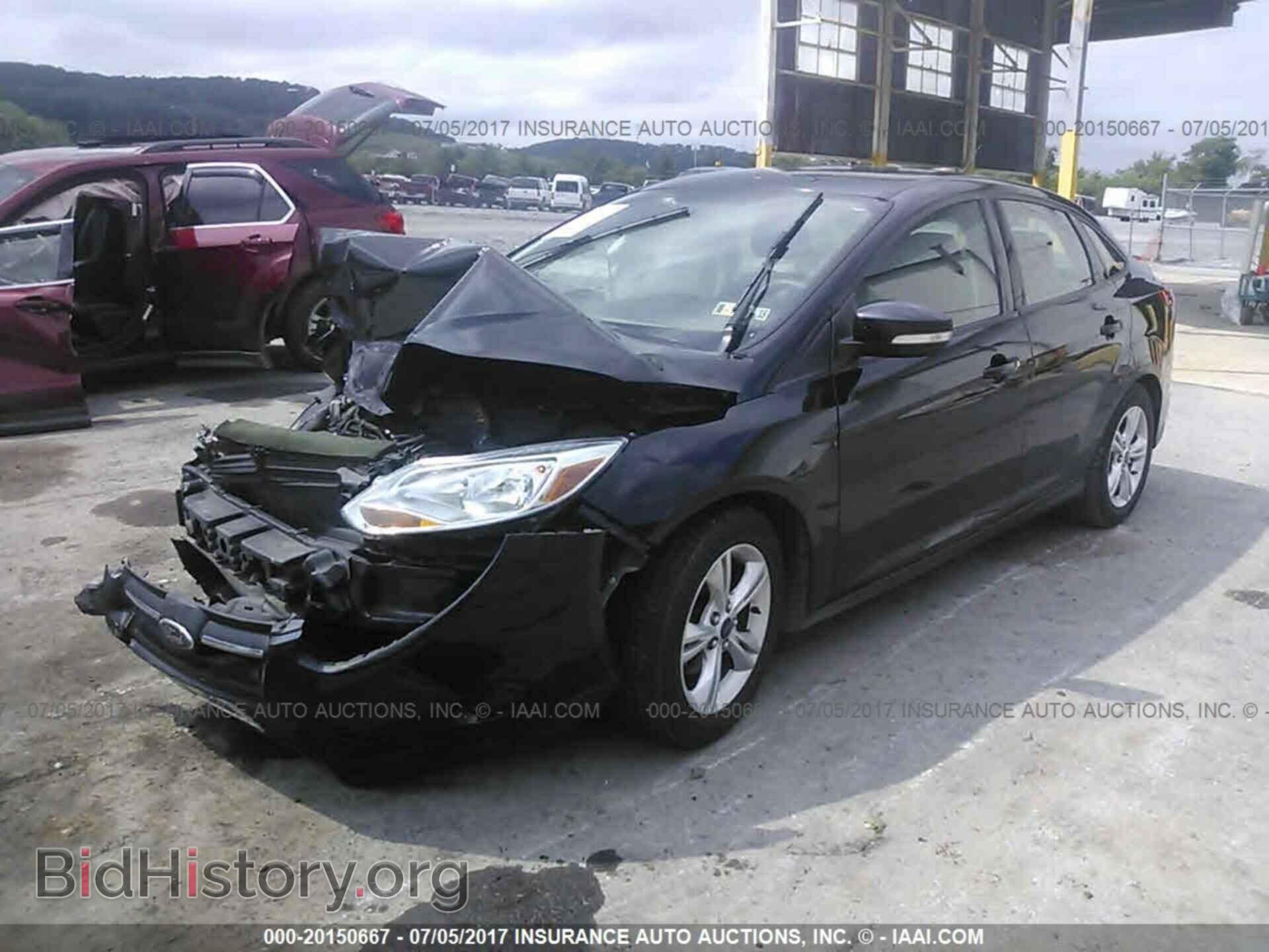 2014 Ford Focus - VIN: 1FADP3F23EL181632 - Фото 2
