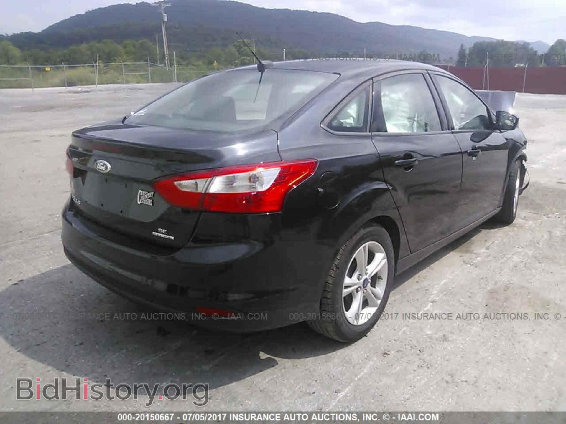 2014 Ford Focus - VIN: 1FADP3F23EL181632 - Фото 4
