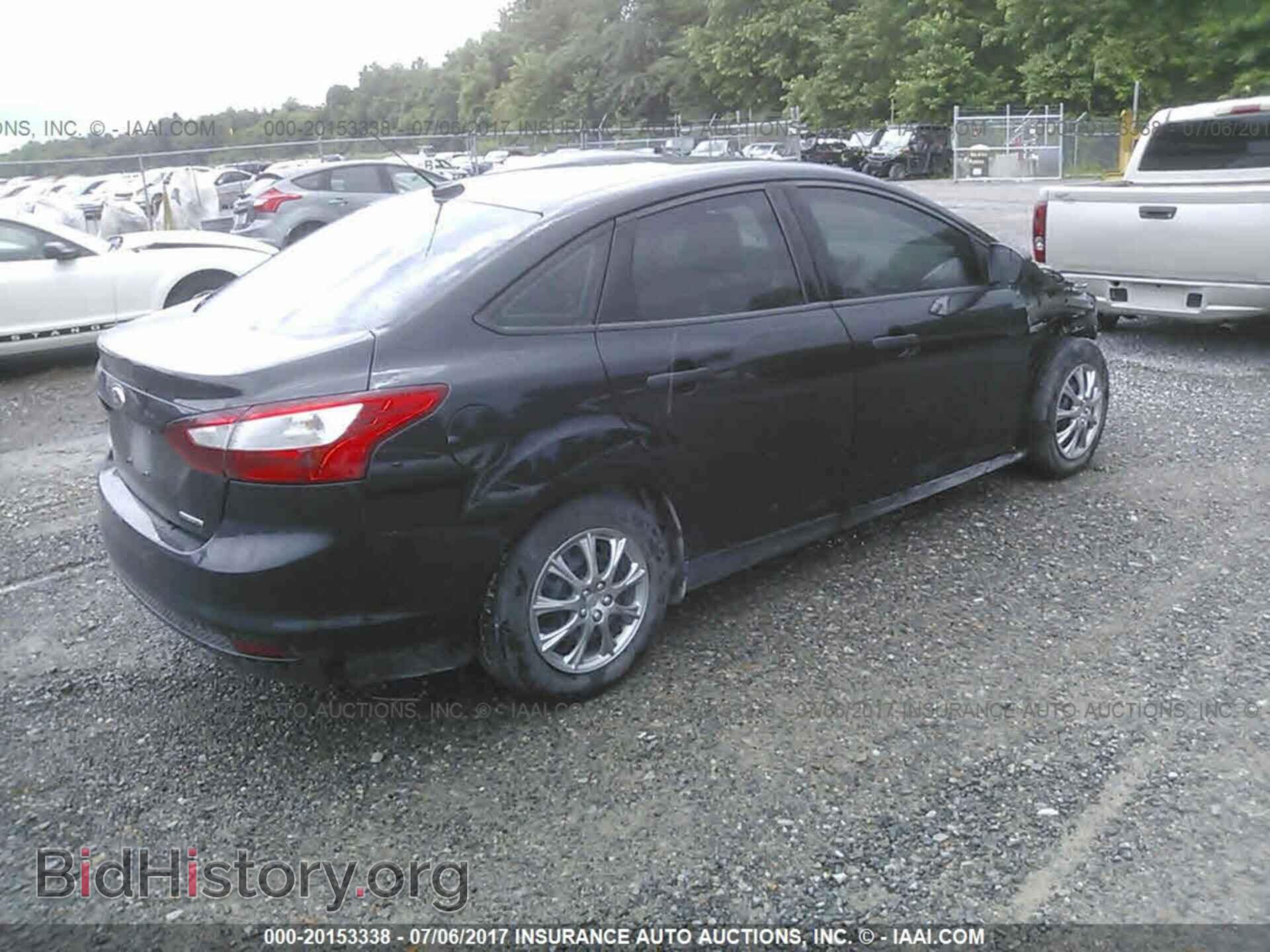 2014 Ford Focus - VIN: 1FADP3E24EL450125 - Photo 4