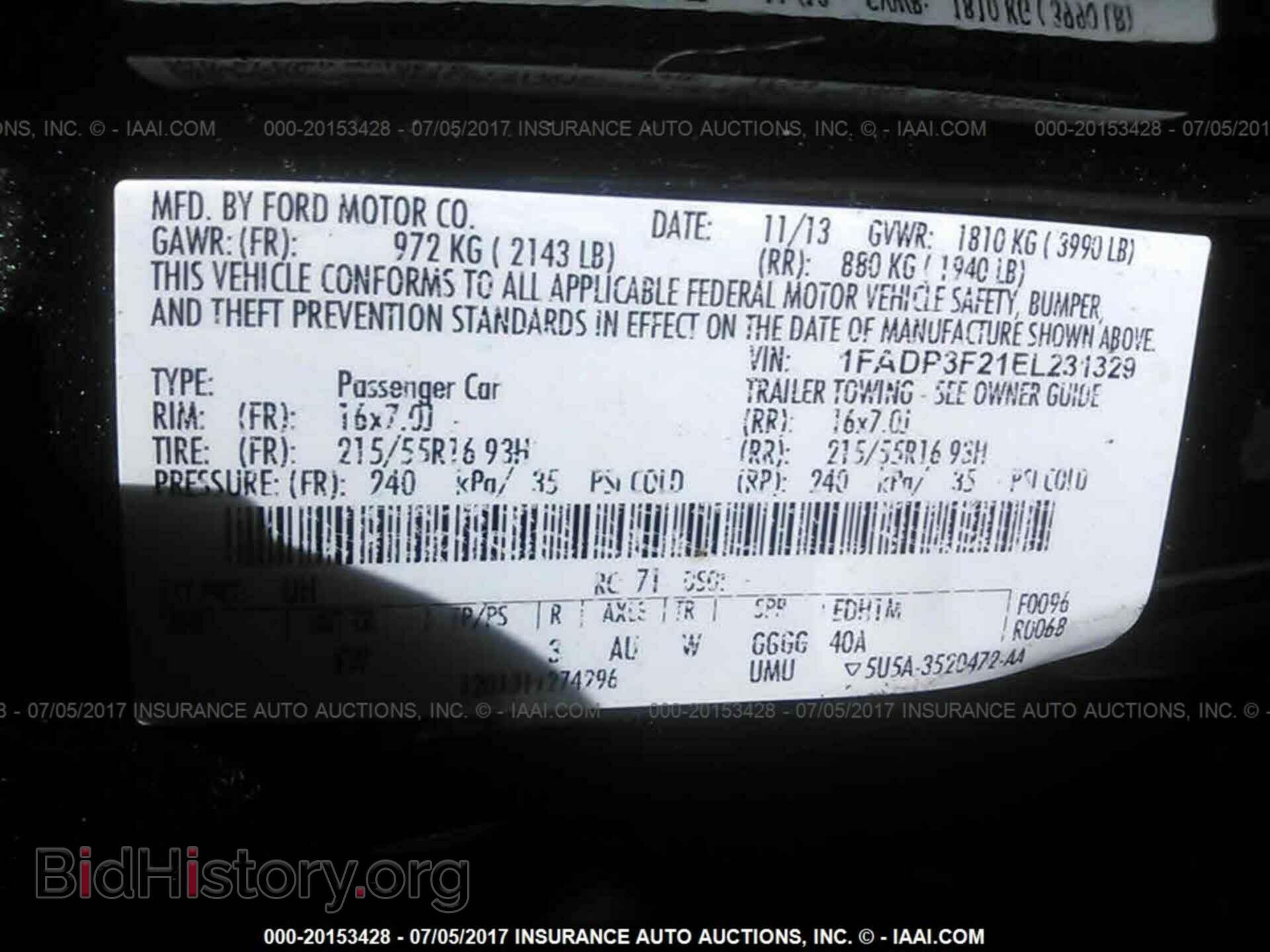 2014 Ford Focus - VIN: 1FADP3F21EL231329 - Фото 9
